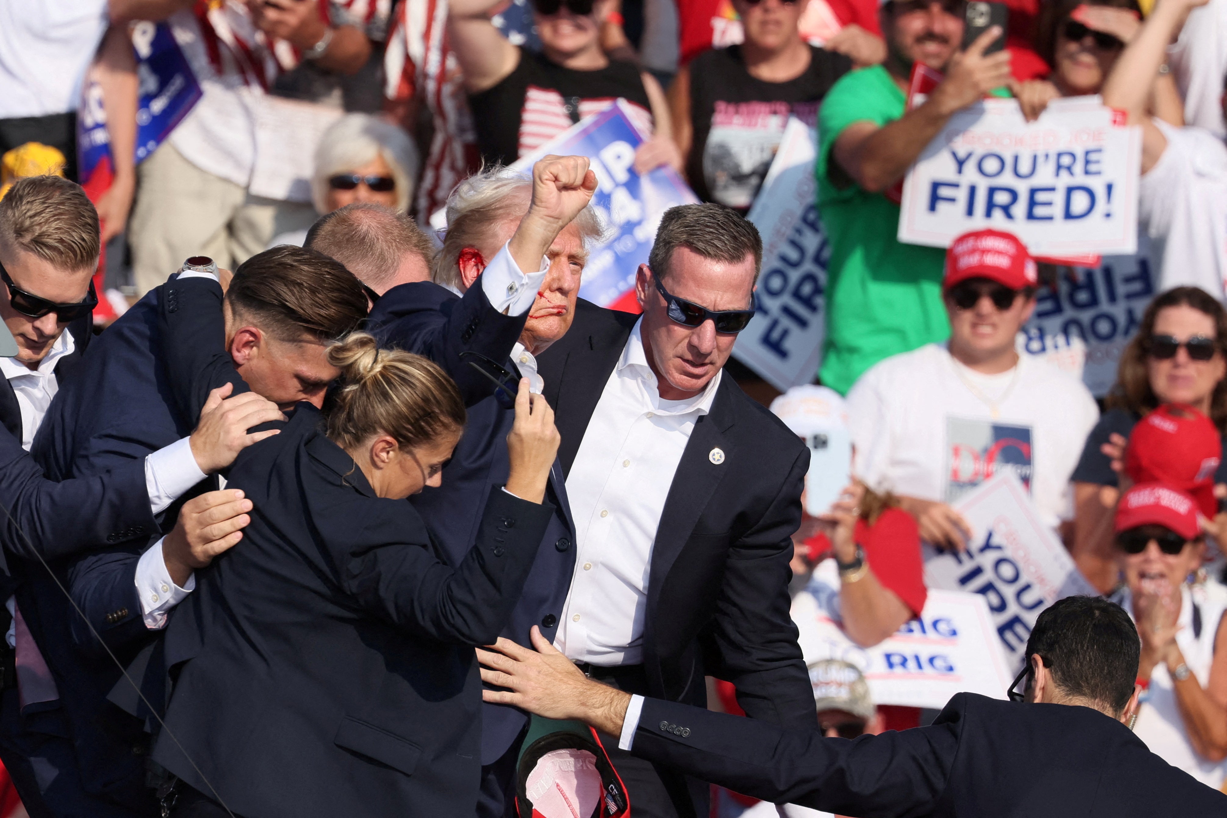 Donald Trump’s Secret Service detail covers the former president after shots were fired during a campaign rally in Pennsylvania on July 13.