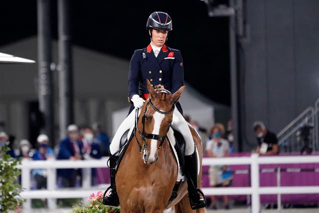 <p>Discraced Charlotte Dujardin, riding Gio, competes in the equestrian dressage individual final at the 2020 Summer Olympics </p>