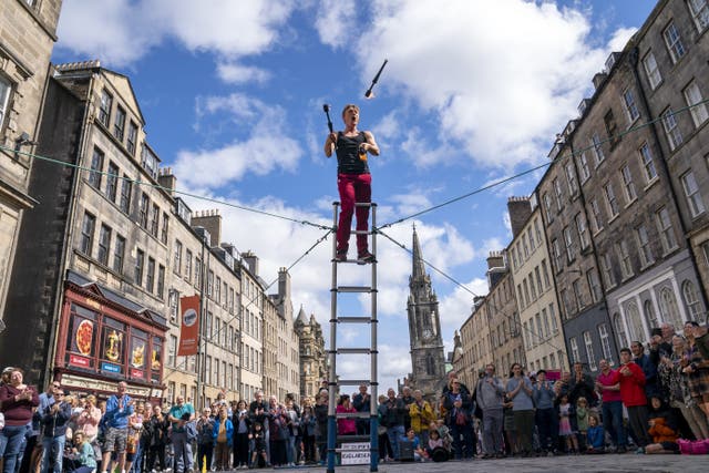 A street performer in Edinburgh’s Royal Mile during the Fringe in 2023 (Jane Barlow/PA)