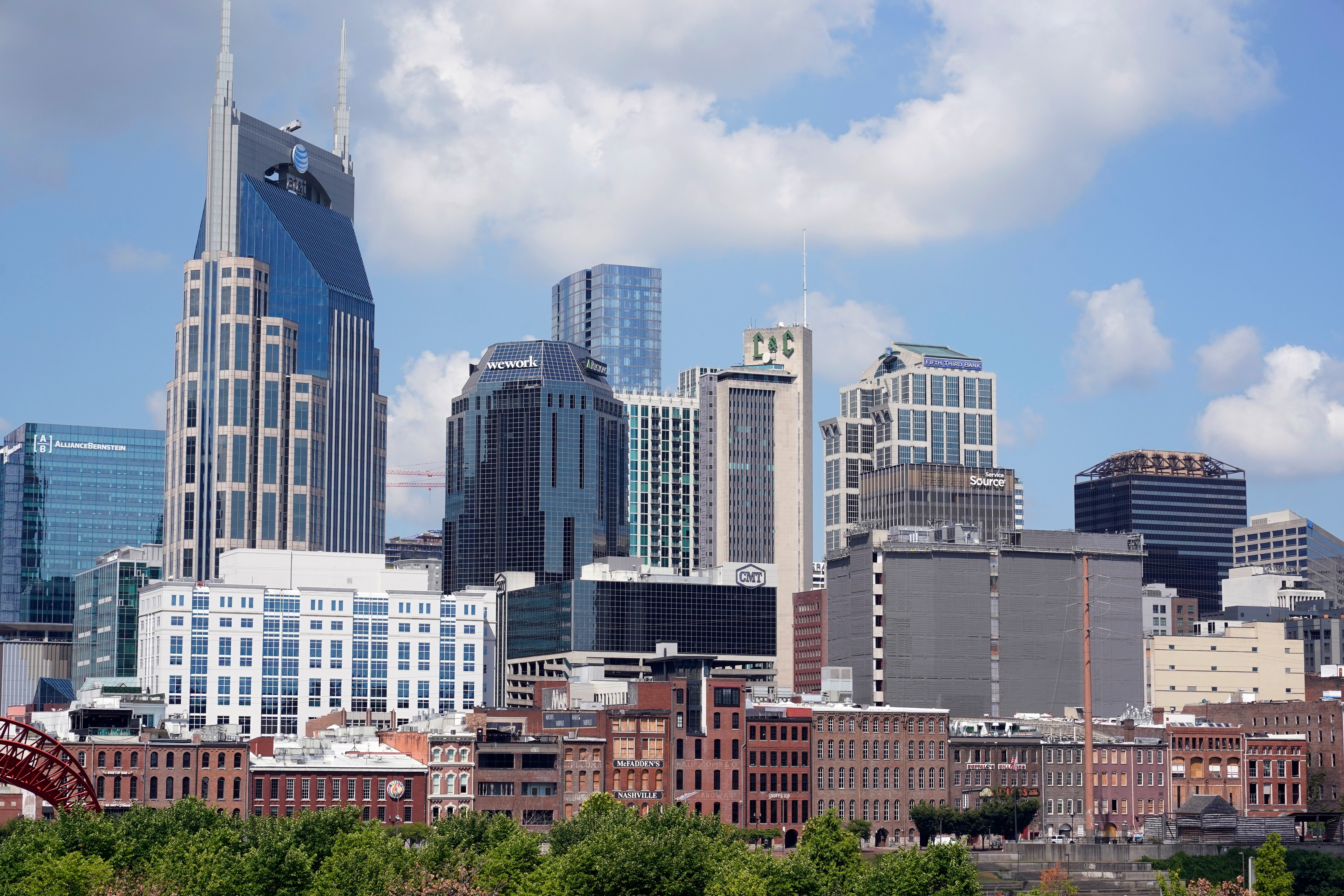 FILE - The Nashville, skyline is seen on July 11, 2022. For weeks, neo-Nazis have made repeat appearances in Nashville, livestreaming antisemitic antics for shock value. (AP Photo/Mark Humphrey, File)