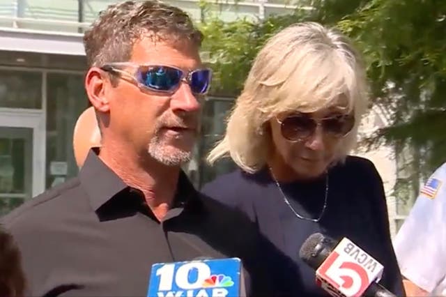 <p>Ted, left, and Shaunna O’Connell, right, outside a Massachusetts courthouse on Monday after she was charged with assaulting her husband</p>