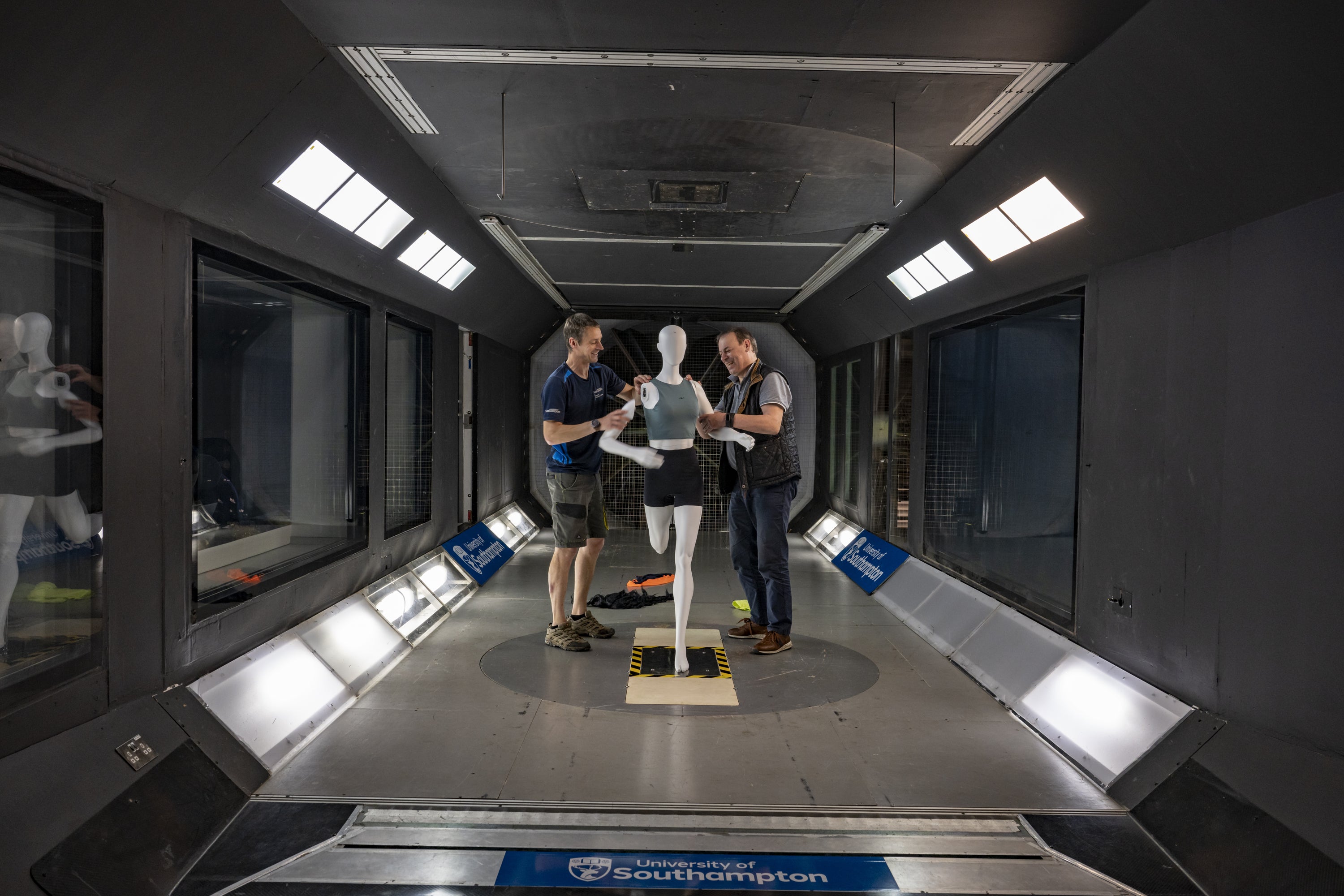 Dr David Marshall of University of Southampton (left) and Professor Bert Blocken preparing a mannequin for wind tunnel tests (Heriot-Watt University/PA)