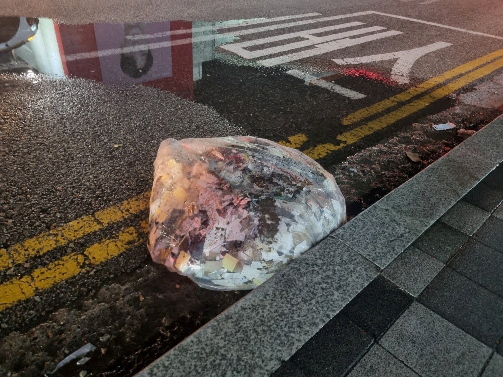 File: A plastic bag carrying various objects including what appeared to be trash that crossed inter-Korean border with a balloon believed to have been sent by North Korea