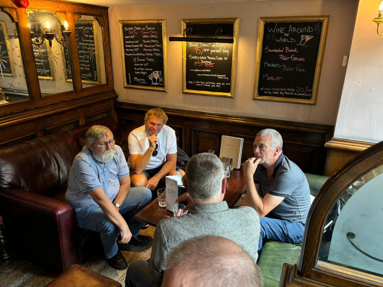 Mark (wearing a white t-shirt) talking to other members at The Men’s VMU gathering in July this year (Collect/PA Real Life) NOTE TO EDITORS: This image must only be used in conjunction with PA Real Life story REAL LIFE MenBreastCancer. All usage is subject to a fee or incorporated into your outlet’s agreed content package. Find copy in full on PA Explore or contact PA Real Life at RealLife2@pamediagroup.com or on 020 7963 7175 for access or queries