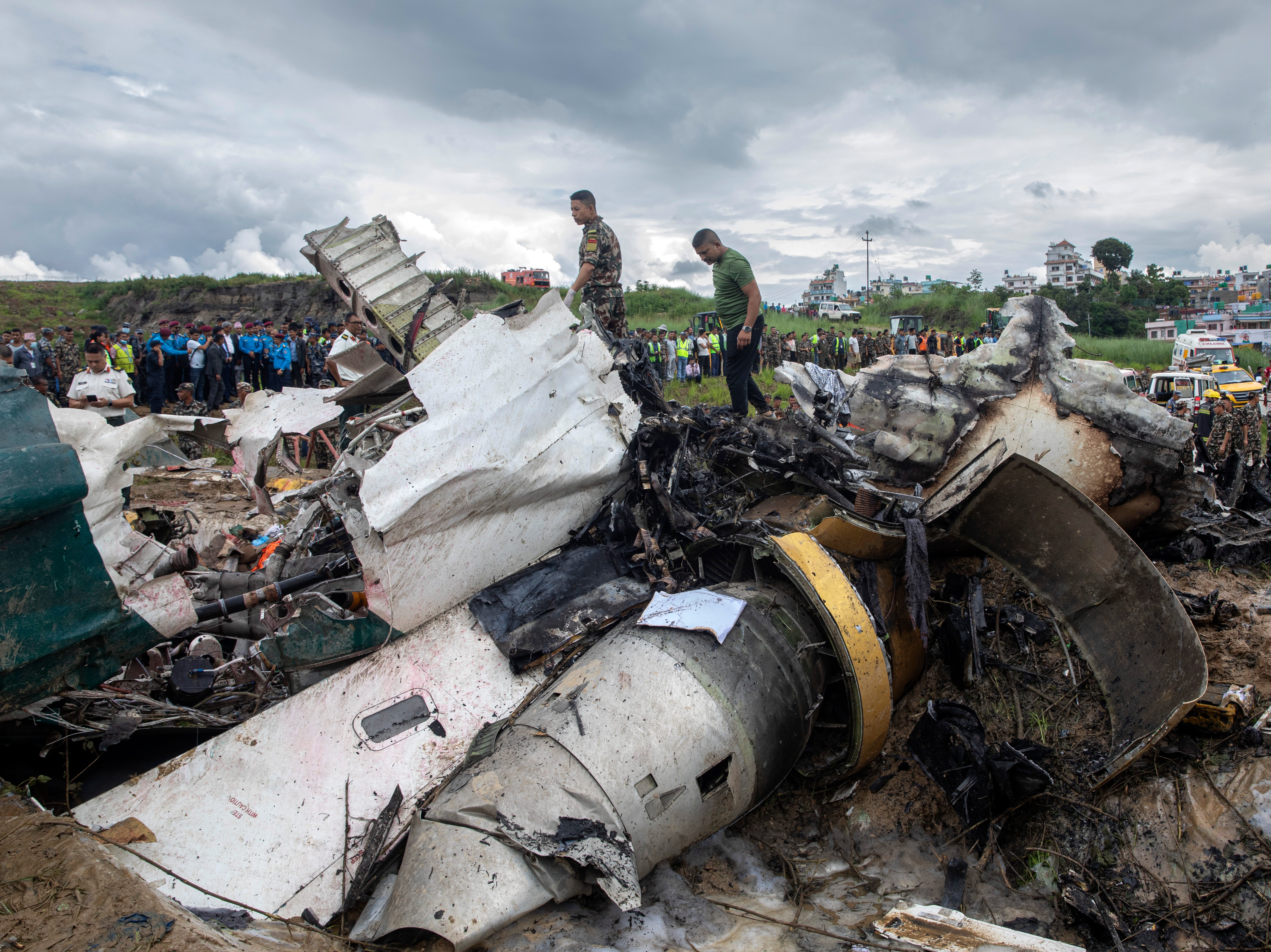 Rescue operations under way at the site of a plane crash at Tribhuvan International Airport in Kathmandu, Nepal, 24 July 2024