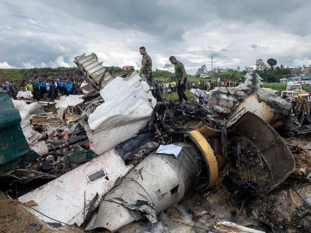 <p>Rescue operations under way at the site of a plane crash at Tribhuvan International Airport in Kathmandu, Nepal, 24 July 2024</p>