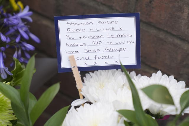 Flowers and tributes laid near scene on the A61 in Wakefield, following a collision between a car and a motorcycle on Sunday afternoon (Danny Lawson/PA)