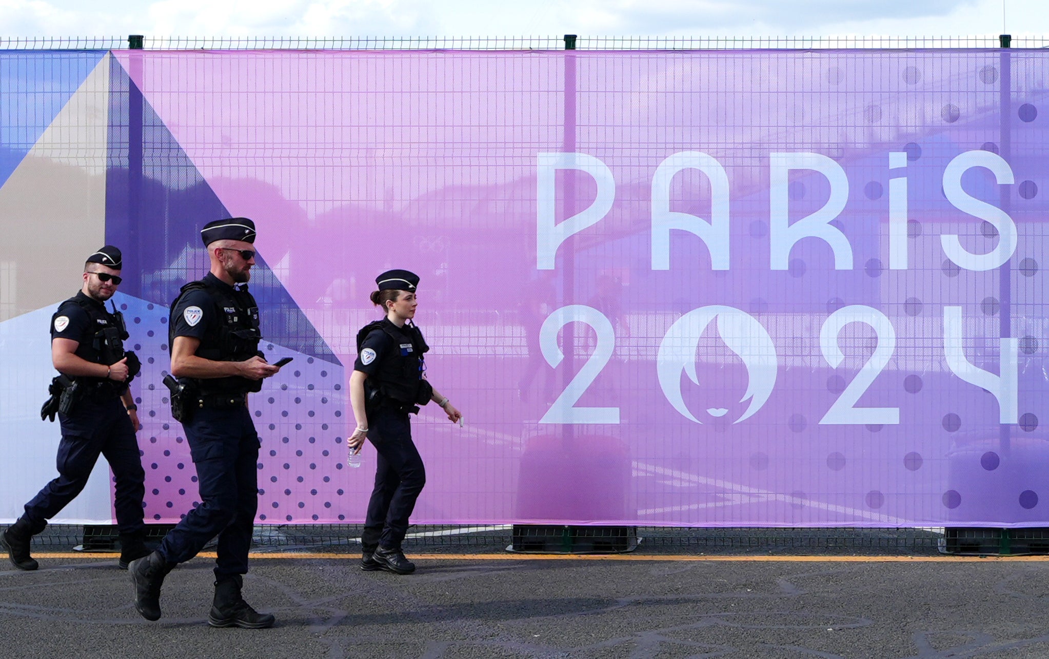 Police patrol the streets ahead of the opening ceremony in Paris