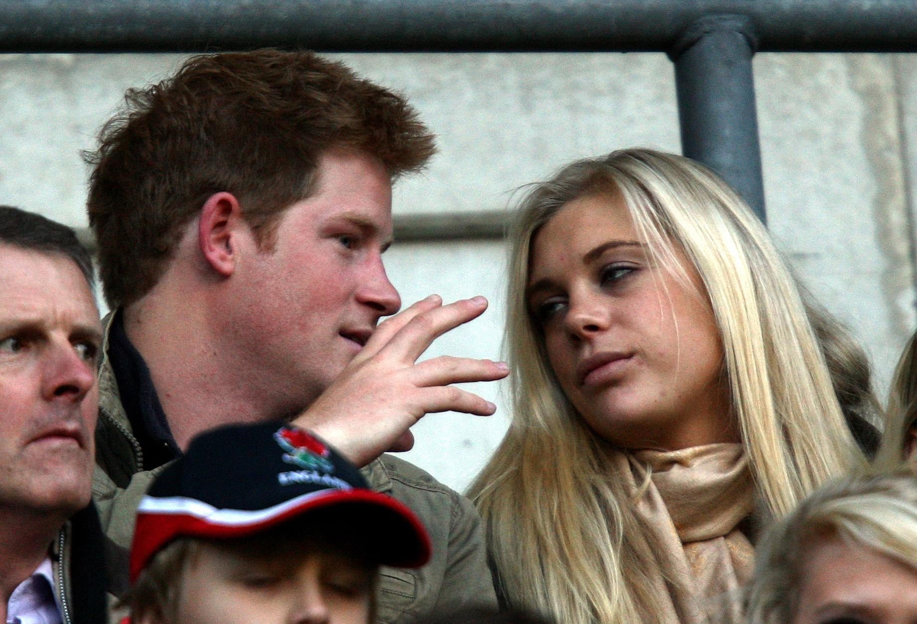 Harry and then-girlfriend Chelsy Davy together at the rugby in 2009 (David Davies/PA)