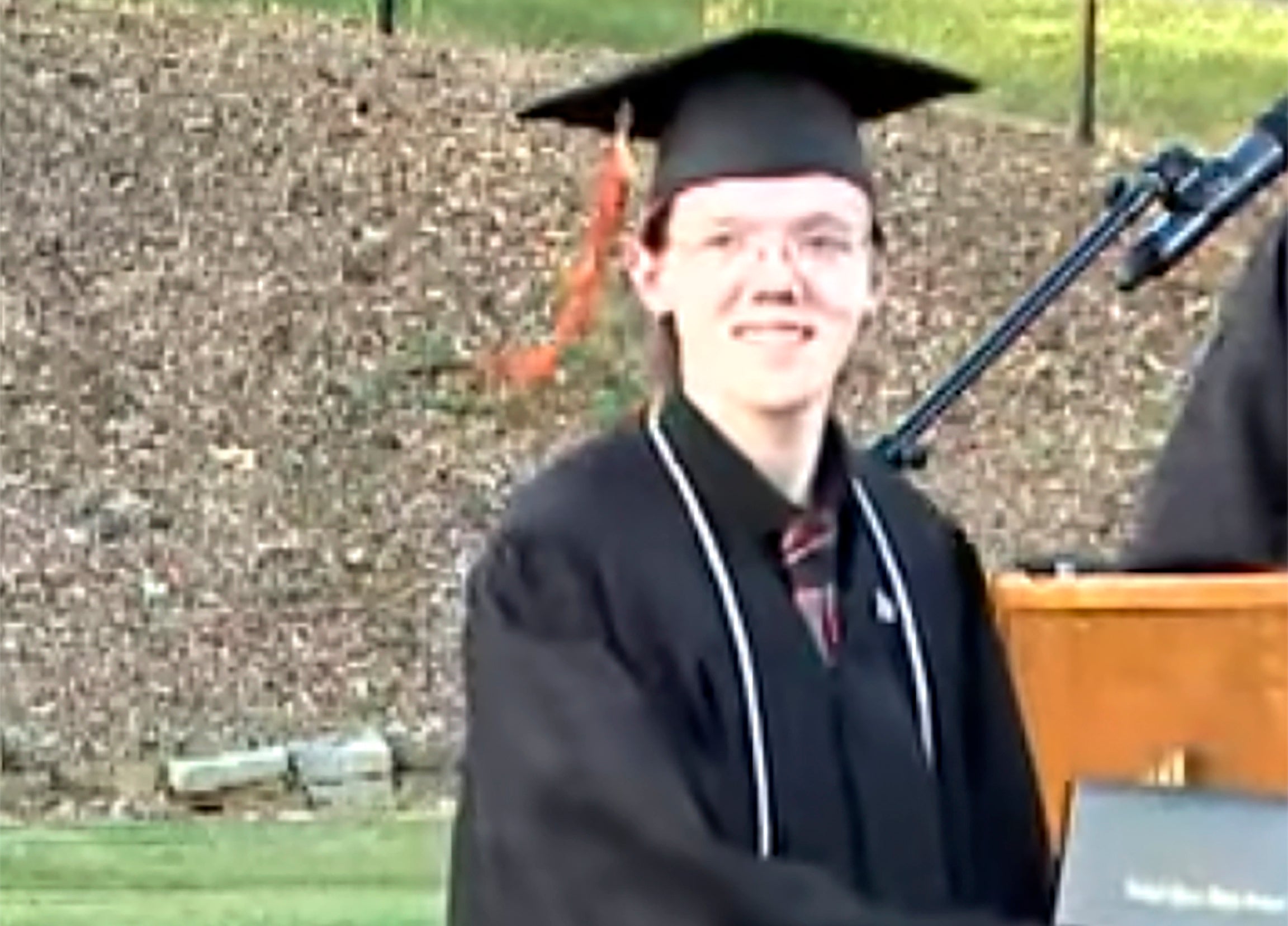 A still image from June 3, 2022, taken from video provided by the Bethel Park School District shows student Thomas Matthew Crooks during a Bethel Park High School graduation ceremony.