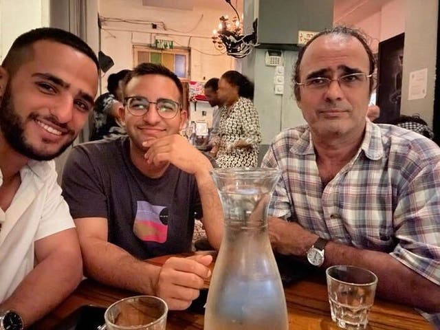 <p>Left to Right: Nimrod, his brother Yotam and his father Yehuda Cohen. Nimrod was captured by Hamas and has been held hostage in Gaza for nearly a year </p>