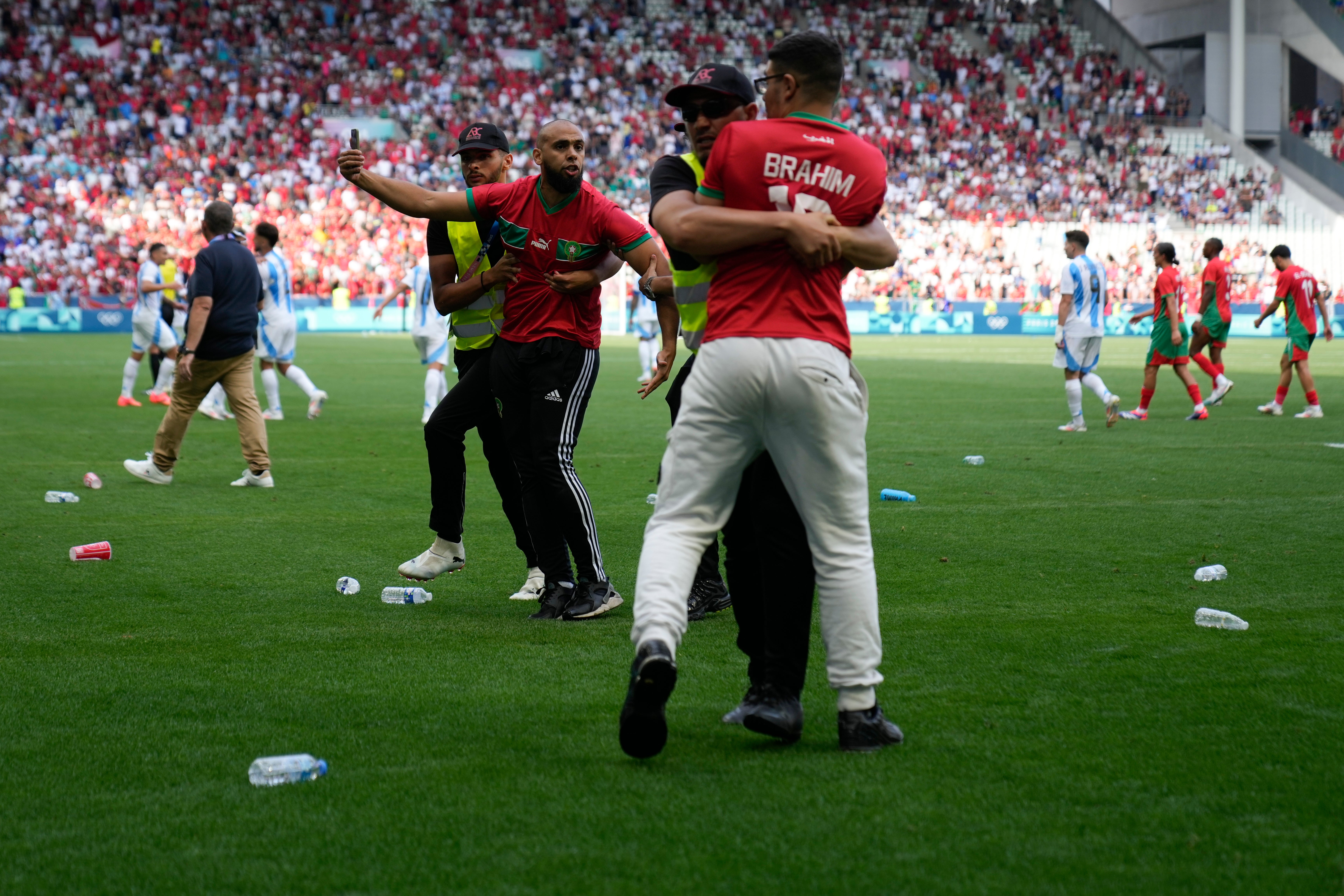 Argentina v Morocco in the men’s football ended with chaotic scenes