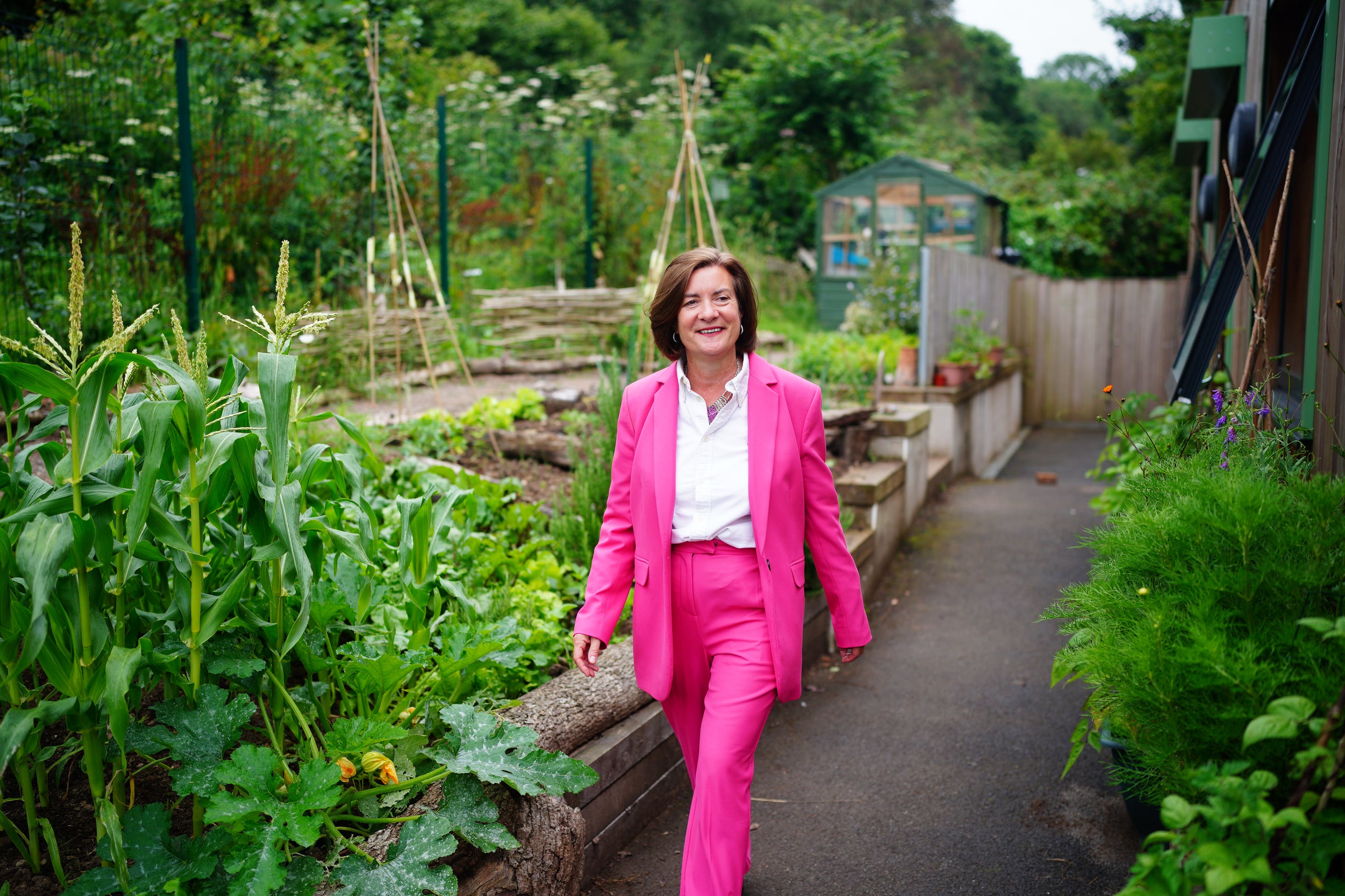 Eluned Morgan, the new Welsh Labour leader, walks in the garden at the Caer Heritage Centre in Caerau, Ely (Ben Birchall/PA Wire)