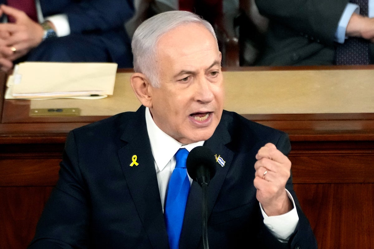 Rashida Tlaib holds up ‘war criminal’ sign during Benjamin Netanyahu’s Congress speech