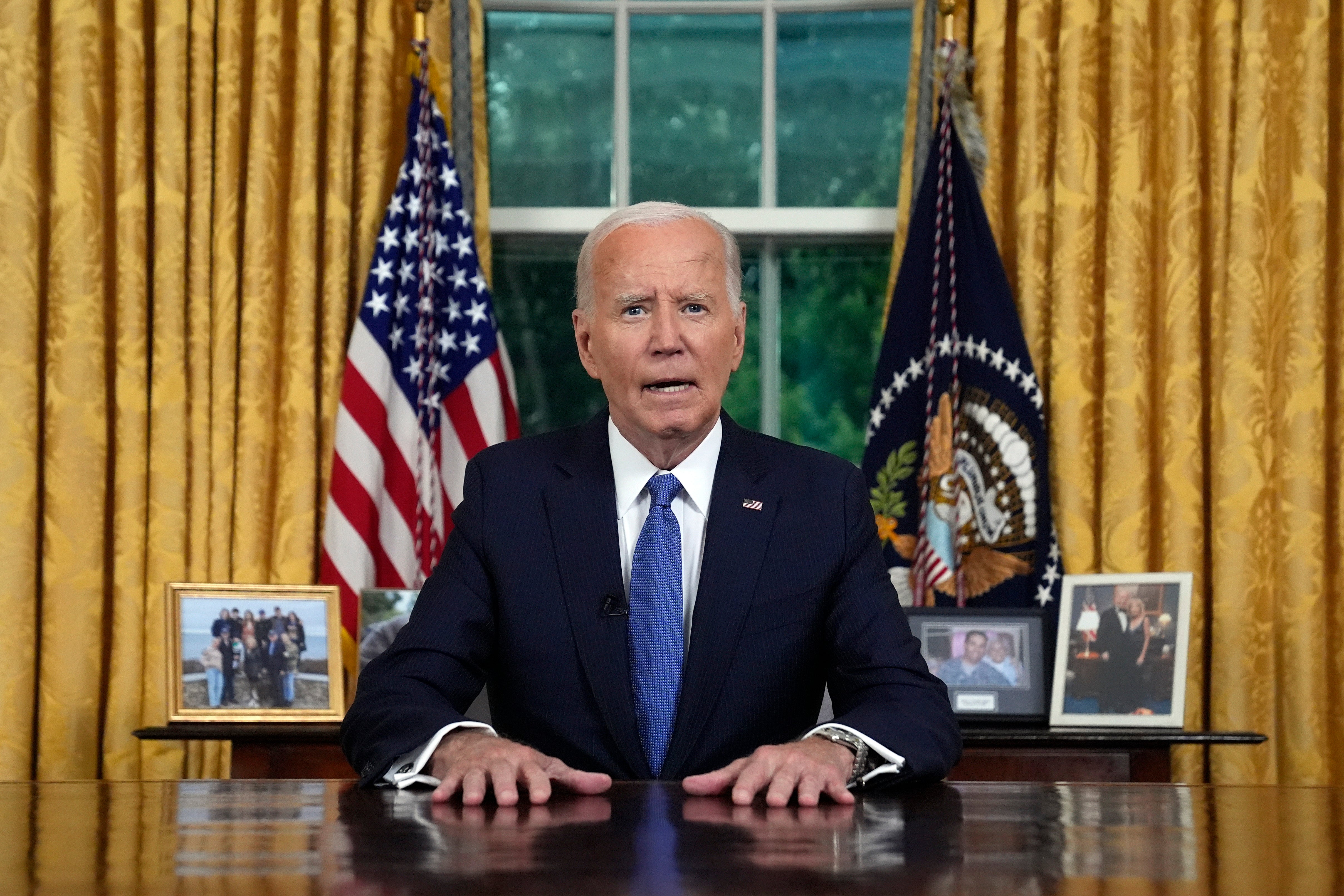 Biden family photos sat behind President Joe Biden as he delivered his address to the nation on Wednesday