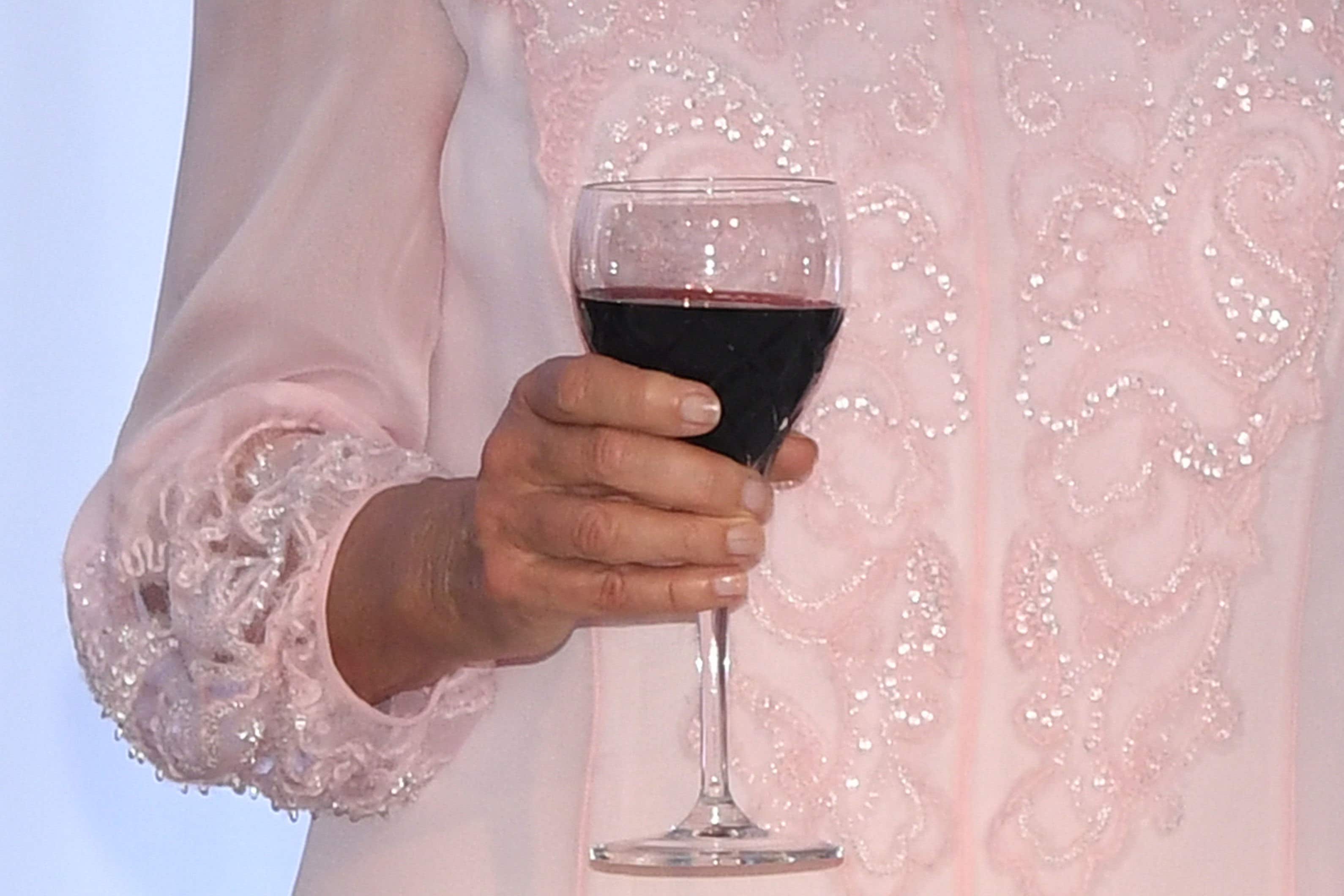 A glass of wine a day may not be as good for you as some research suggested (Joe Giddens/PA)