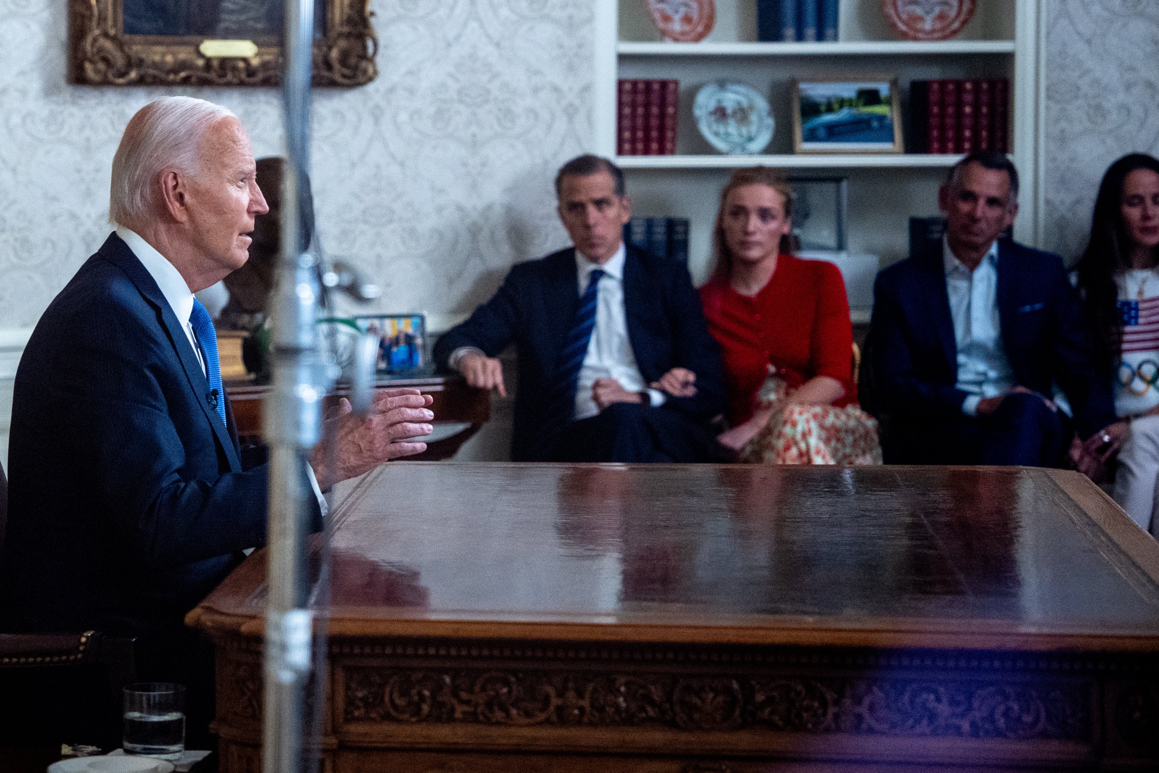 Hunter Biden (left) and his daughter, Finnegan Biden (center left), pictured with Ashley Biden (far right) and Howard Krein (center right) when President Joe Biden announced he was dropping out of the presidential race