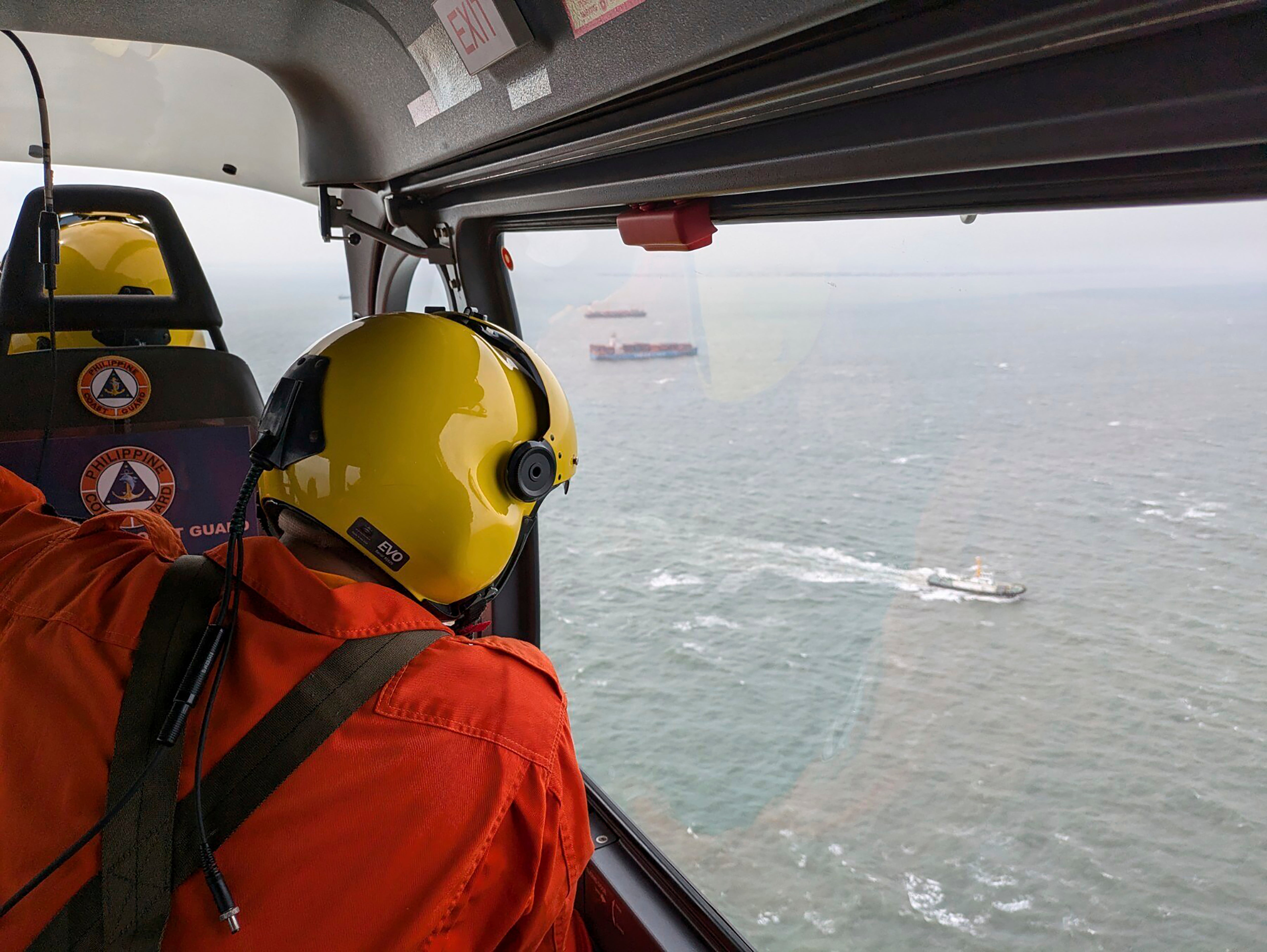 An aerial survey is conducted by Coast Guard Aviation Command as part of the oil spill response operation in Manila Bay, Philippines