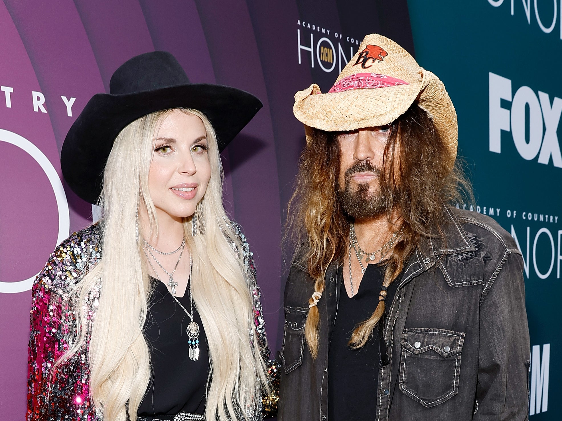 Australian singer Firerose (left) and her estranged husband, Billy Ray Cyrus