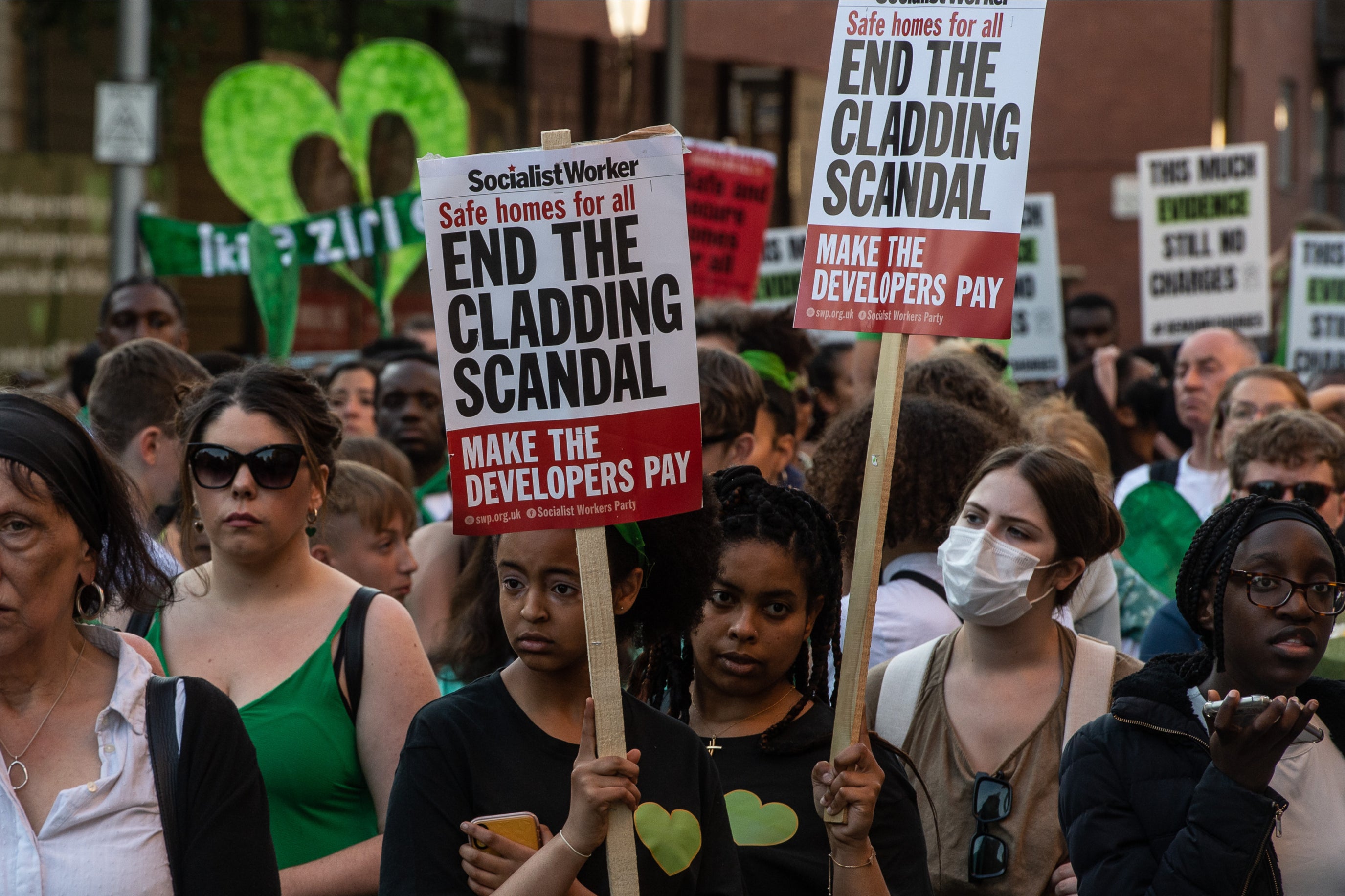 Protesters in 2022 attend the fifth ‘silent walk’ in memory of Grenfell