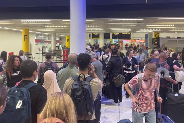 Passengers at Gatwick Airport as airlines continue to deal with the fallout from the global IT outage (Luke O’Reilly/PA)