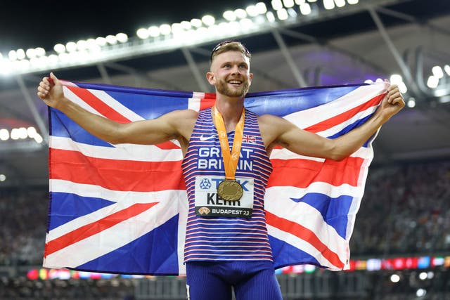 <p>Josh Kerr after winning World Championship gold in Budapest  </p>