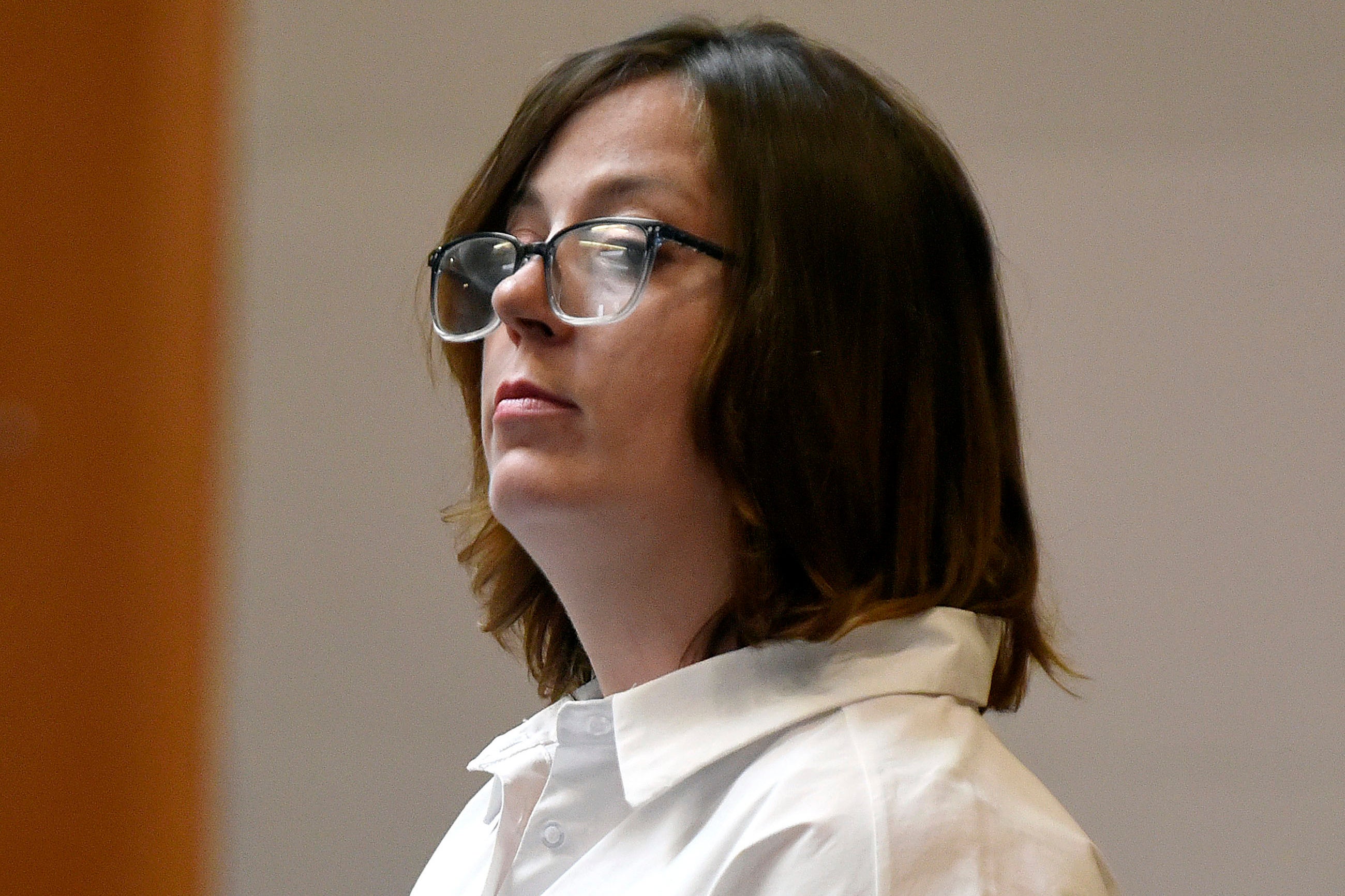 Eckersley stands as the jury enters the courtroom for her trial at Hillsborough County Superior Court last Thursday