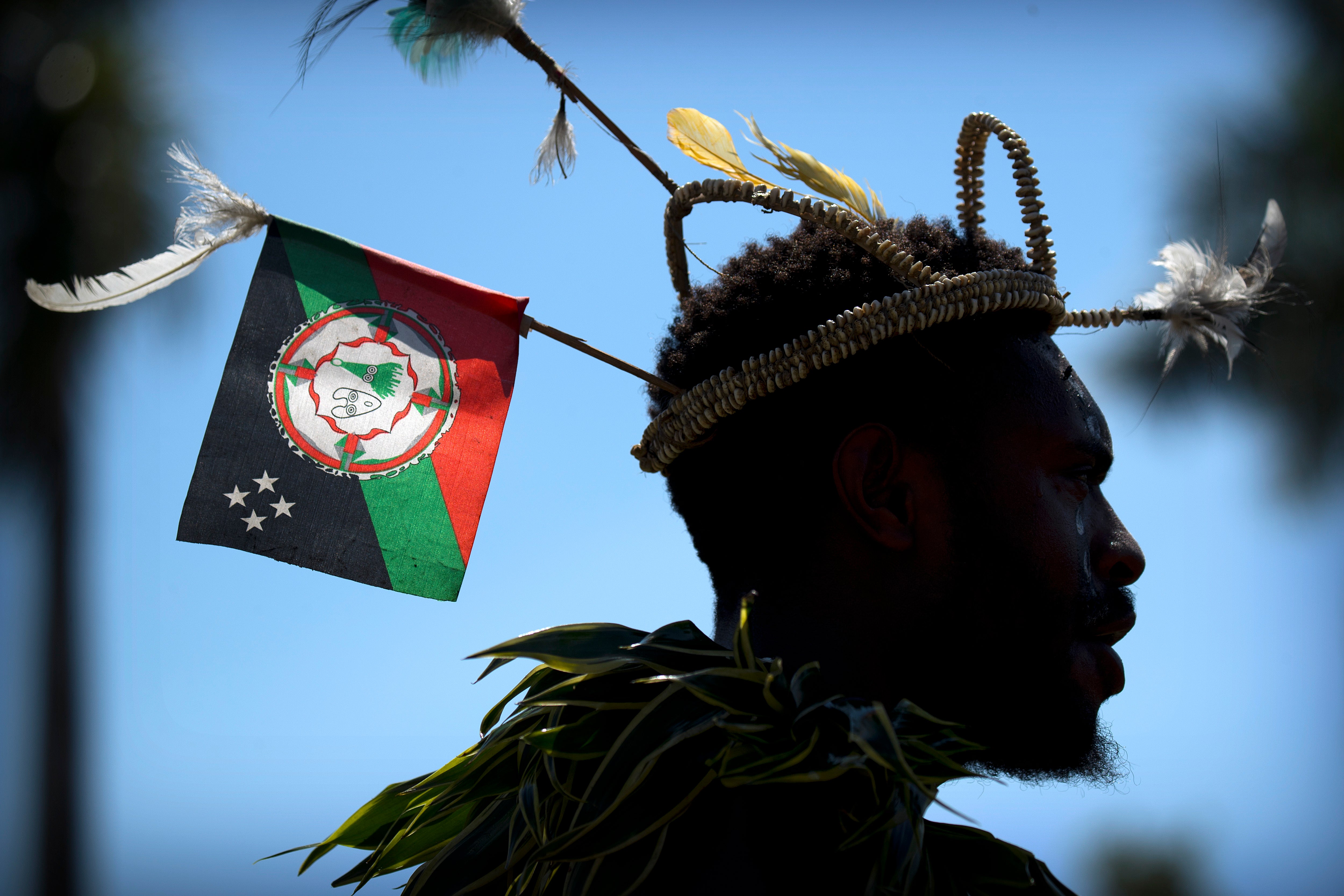 A performer in traditional dress in Port Morseby, Papua New Guinea