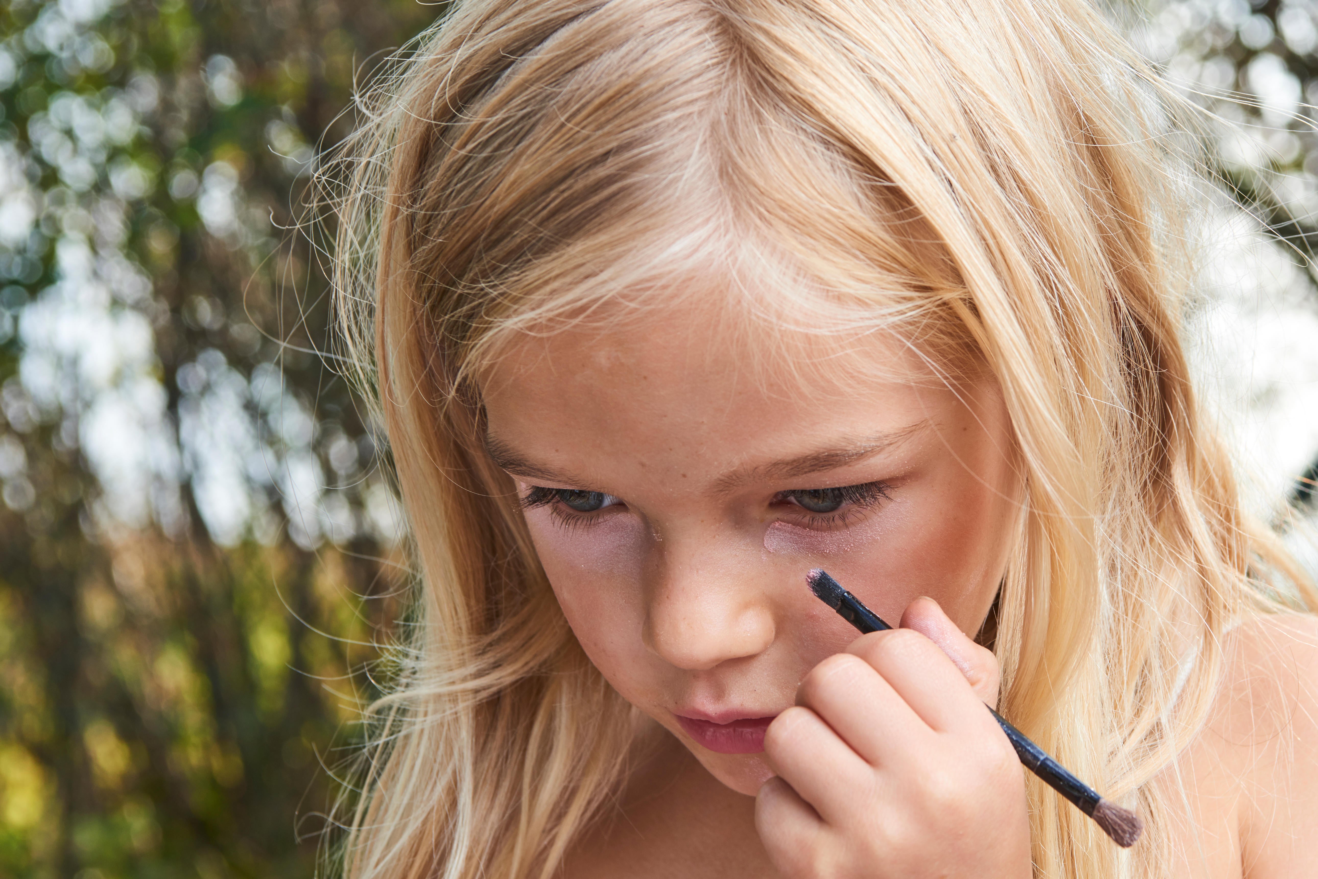 Playing with cosmetics without the expectation of conforming is key to dopamine make-up (Alamy/PA)