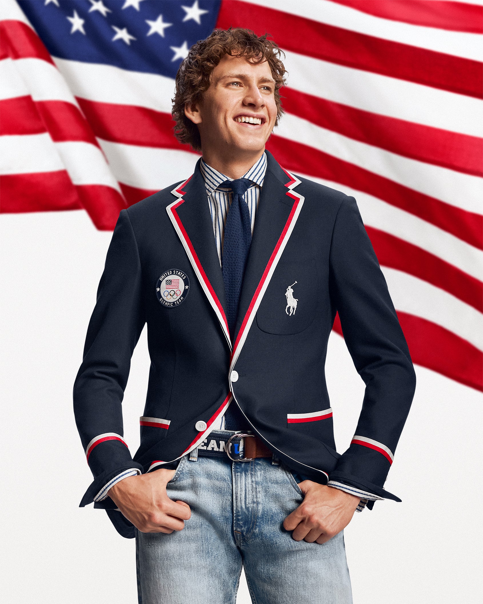 Skateboarder, Jagger Eaton, models the all-American look with a laid-back belt and jeans and navy blazer (Ralph Lauren/PA)