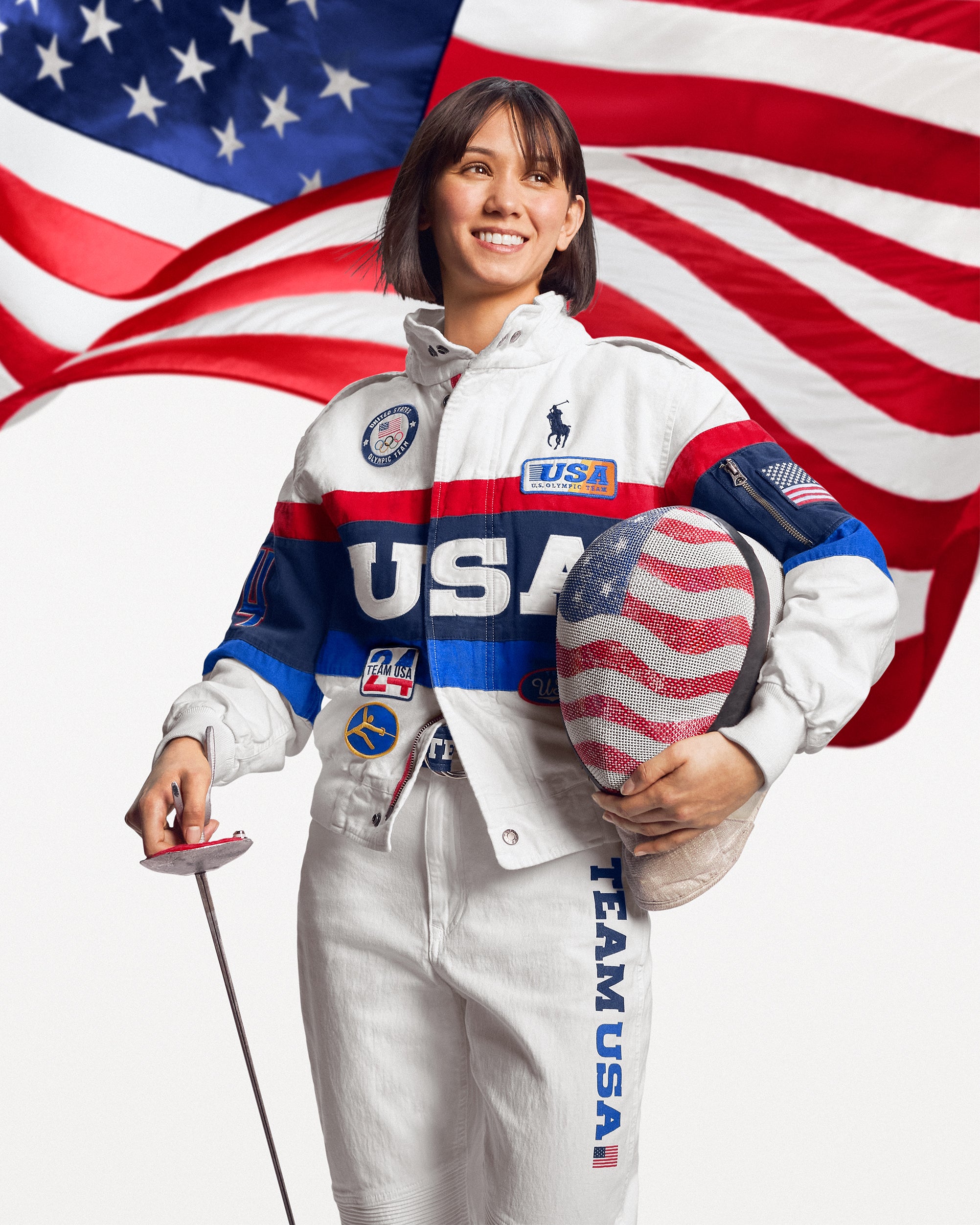 Fencer, Lee Kiefer, poses in women’s closing ceremony kit with American flag embellished mask (Ralph Lauren/PA)