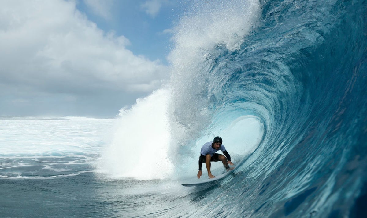 How is wave forecasting done for surfing and how is it used at the Olympics in Tahiti?