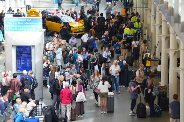 Passengers queue at the Eurostar terminal at St Pancras station (James Manning/PA)