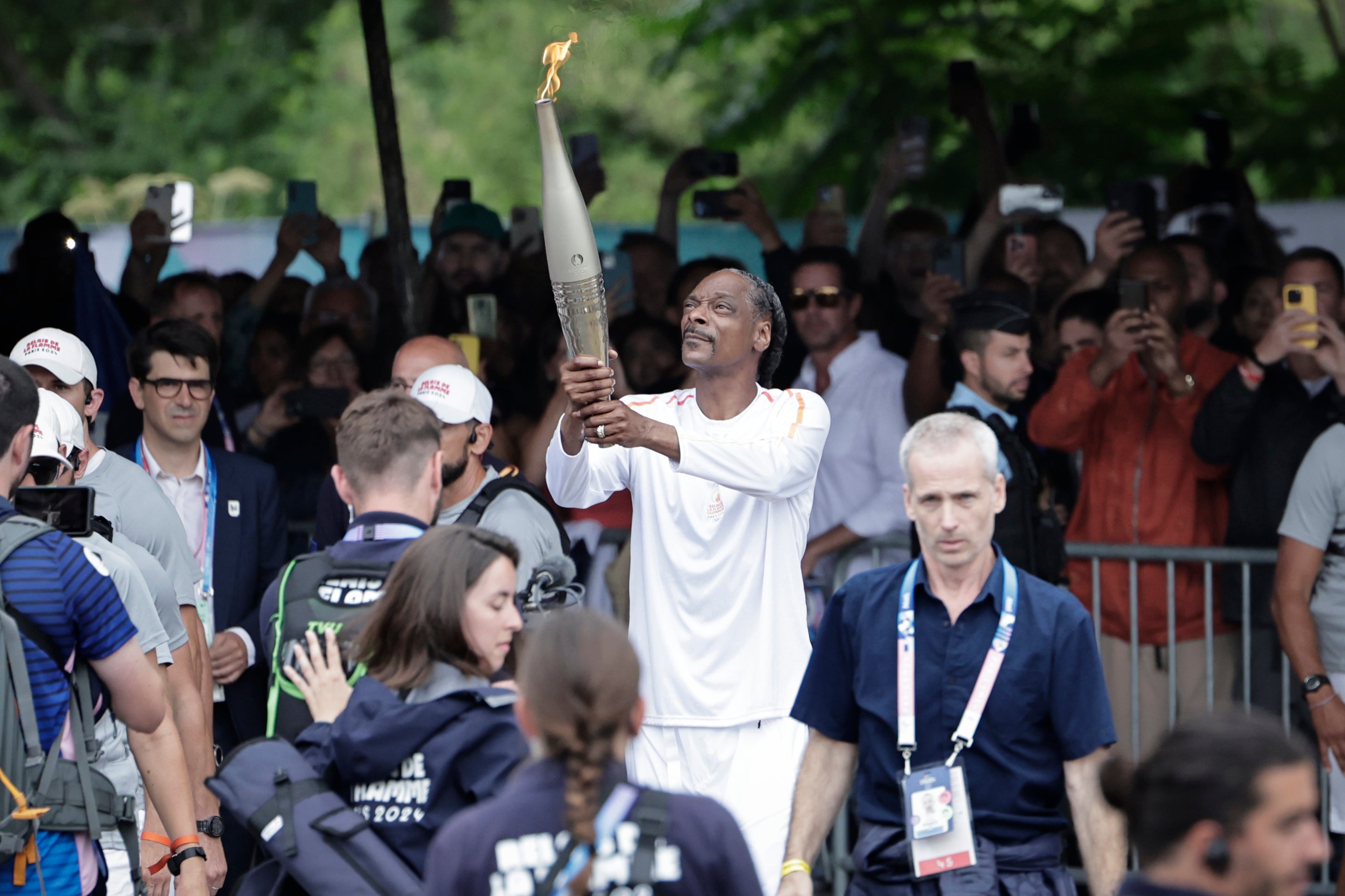 Plenty of well-wishers watched on as Snoop carried the flame