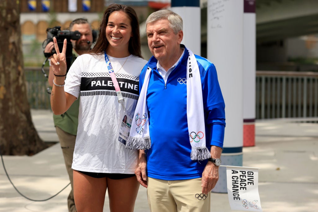 Valerie Rose Tarazi of Team Palestine and IOC President Thomas Bach