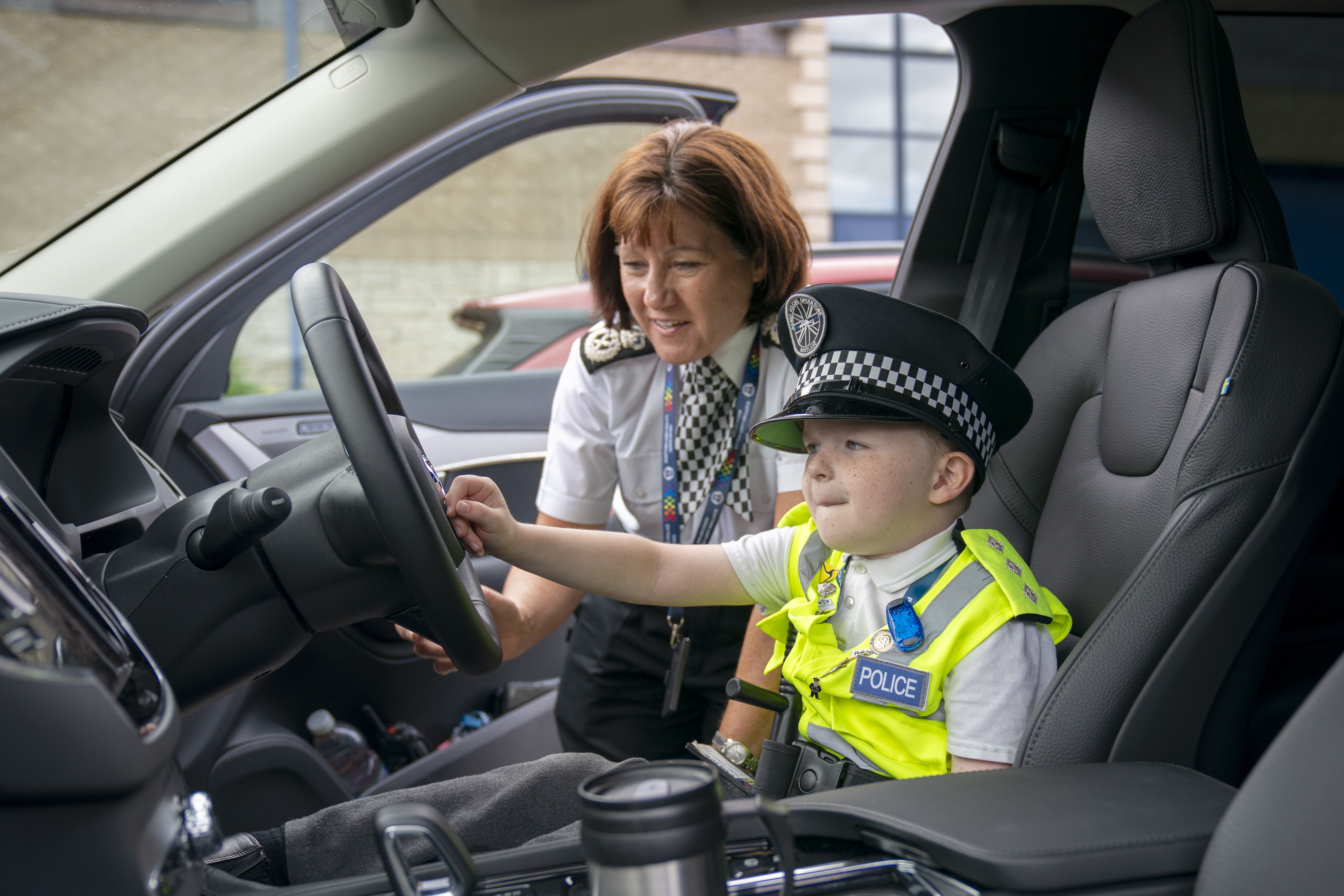 Six-year-old Anthony Green meets Chief Constable of Police Scotland Jo Farrell during a visit to Glenrothes Police Station in Fife (Jane Barlow/PA)