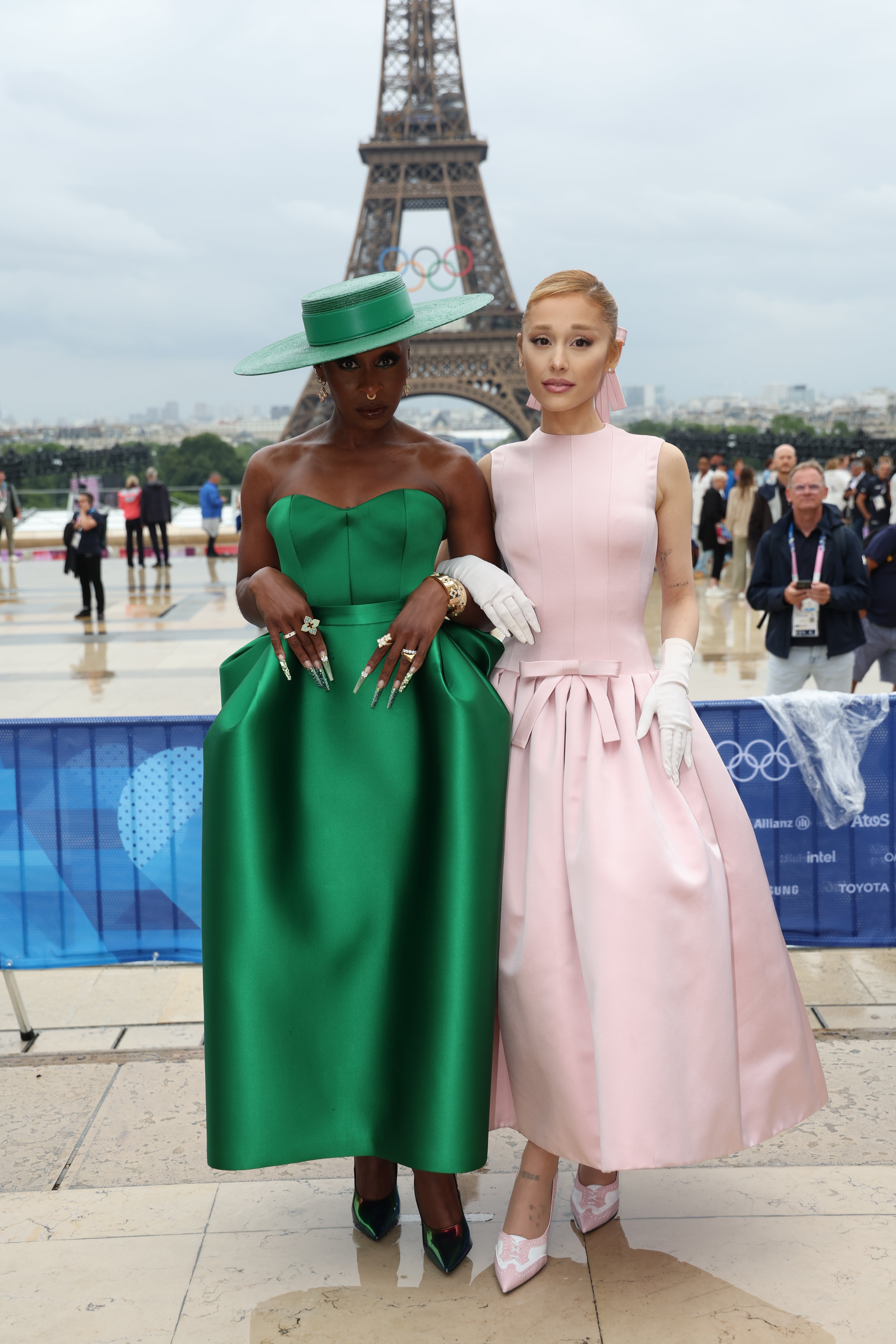 In true Wicked form, the two musical stars donned emerald green (Erivo) and baby pink (Grande) gowns, subtly promoting their upcoming film adaptation of the beloved Broadway show.
