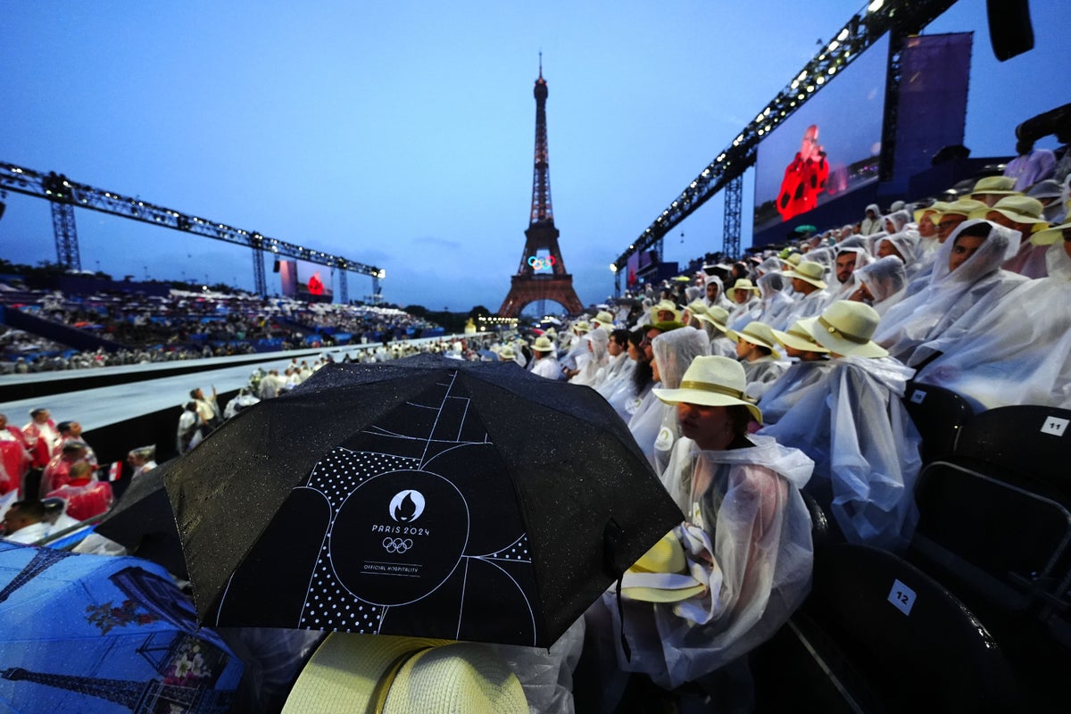 Rain puts a dampener on the Paris Olympics opening ceremony down the River Seine