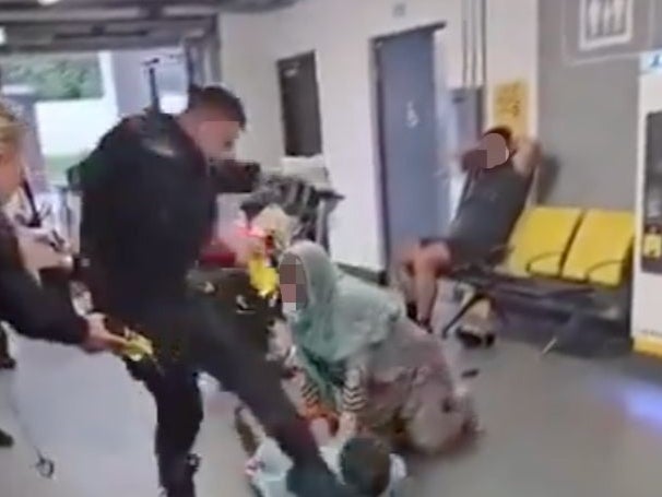 The footage saw a man kicked and stamped on at Manchester Airport