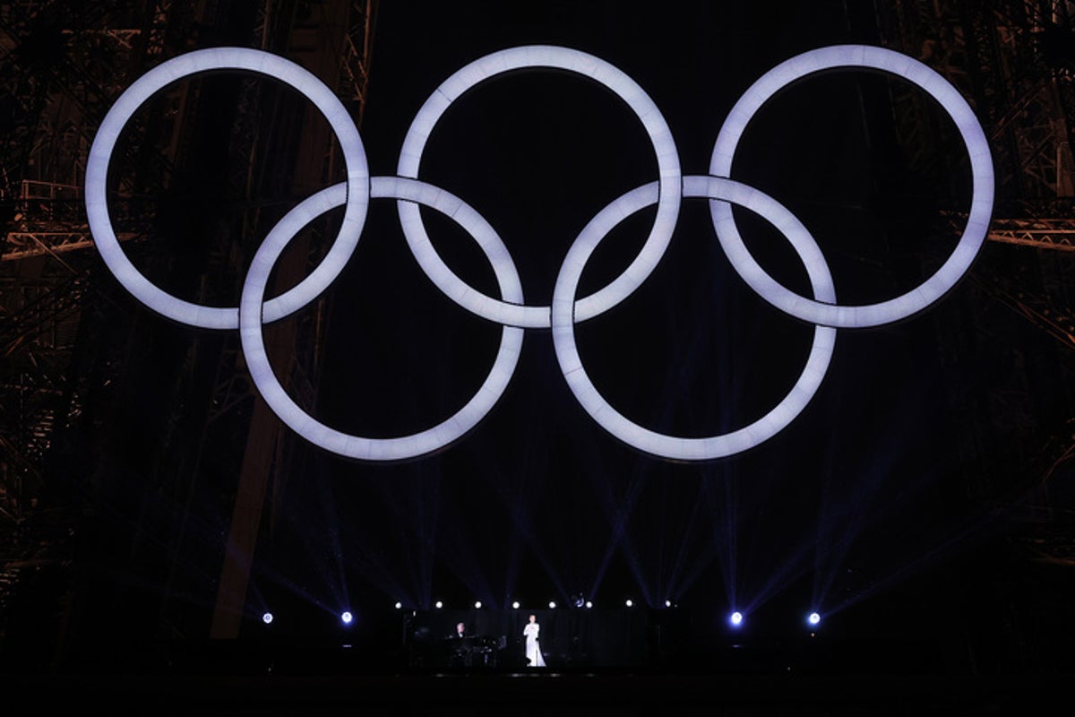 Celine Dion stuns in dazzling dress on Olympic stage