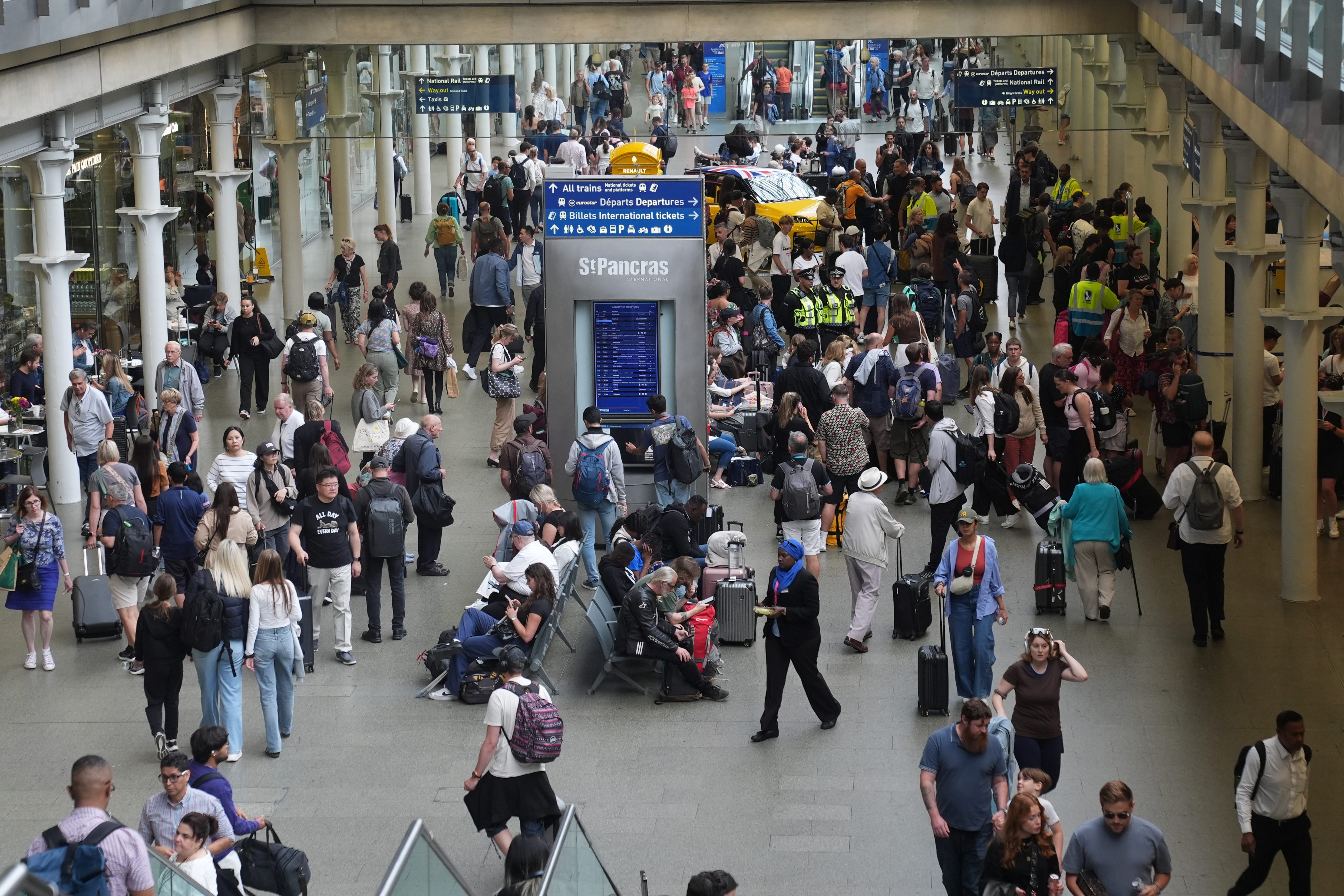 Passengers at the Eurostar terminal at St Pancras station