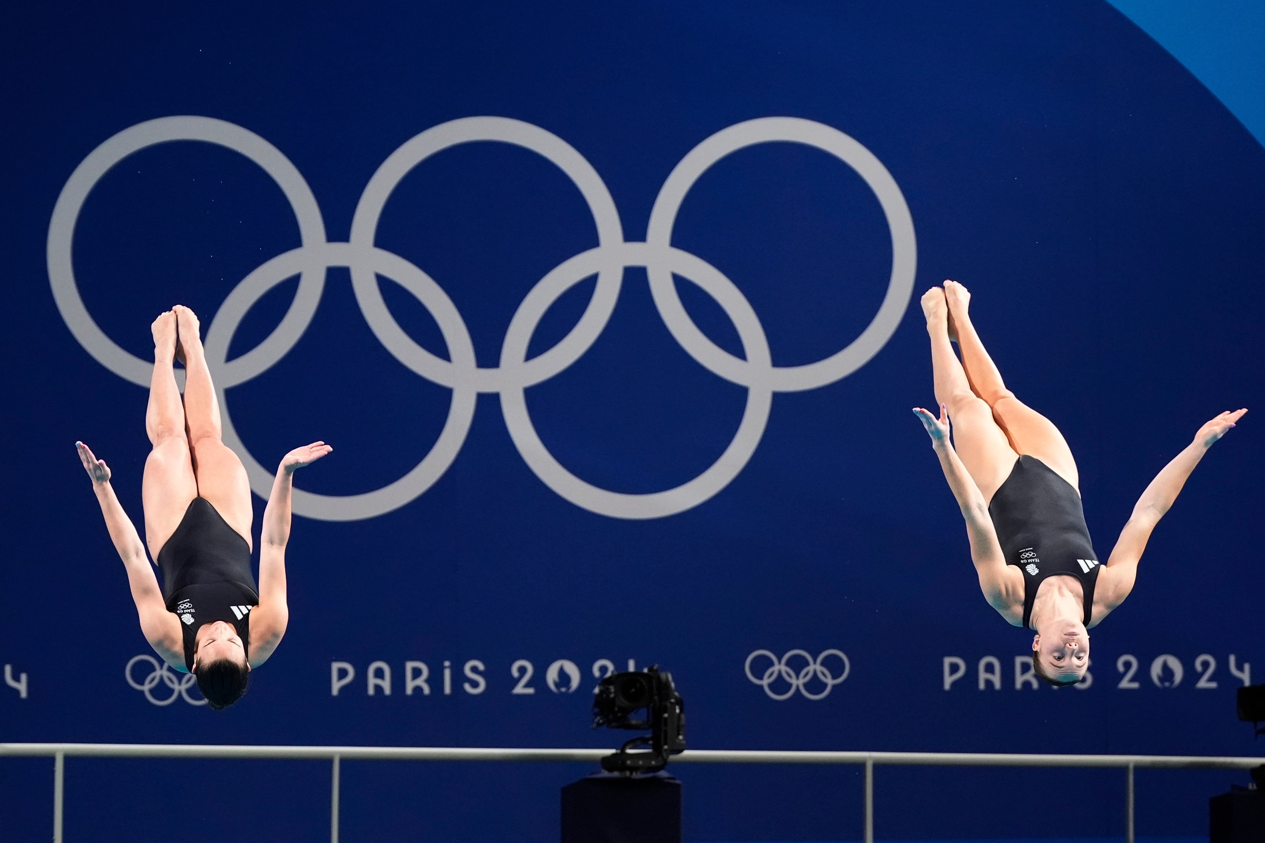 Britain's Yasmin Harper and Scarlett Mew Jensen compete in the women's synchronised 3m springboard diving final