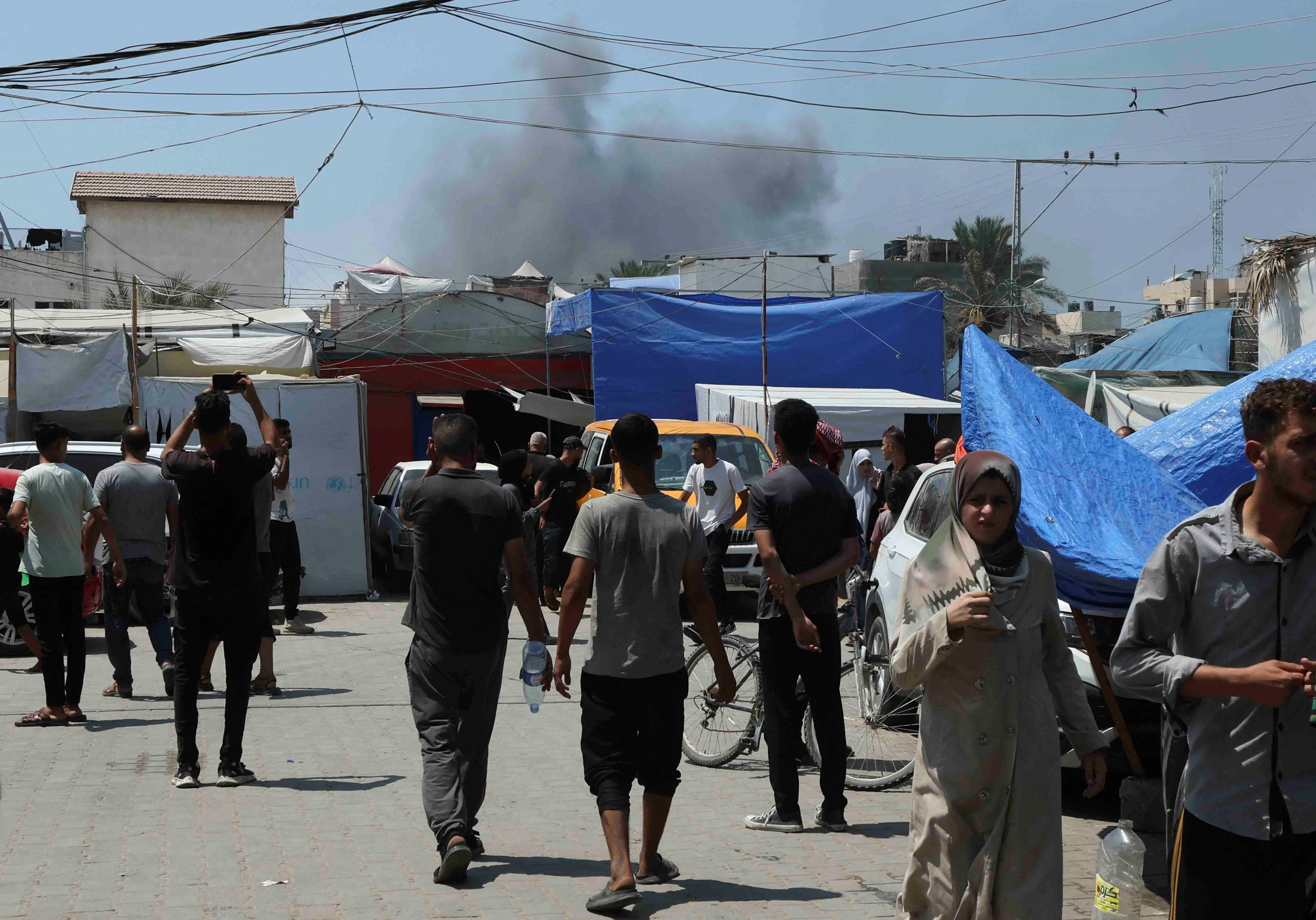 Smoke rises during an Israeli strikeon Deir Al-Balah