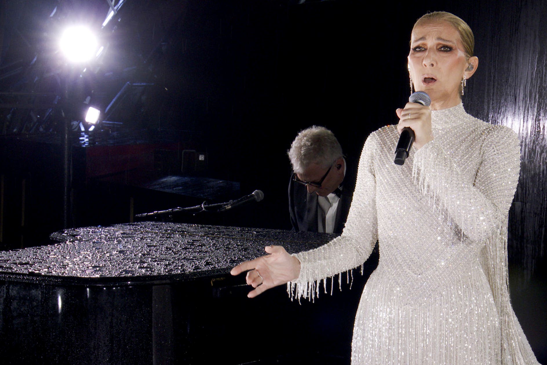 Dion marked her comeback as the closing act of the Olympic opening ceremony (Olympic Broadcasting Service/AP)