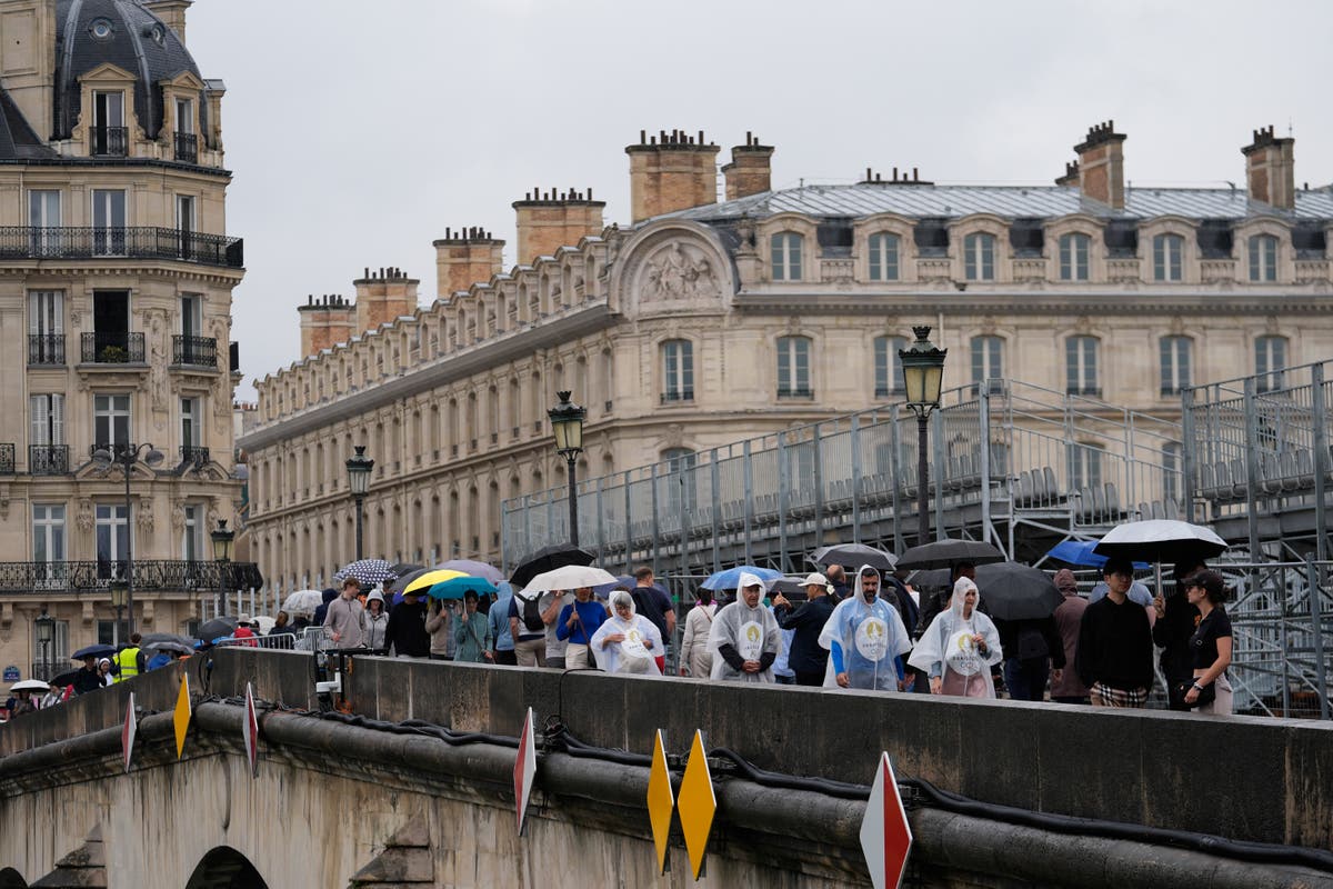 Paris barricades start to come down after opening ceremony on the Seine, but many still struggling