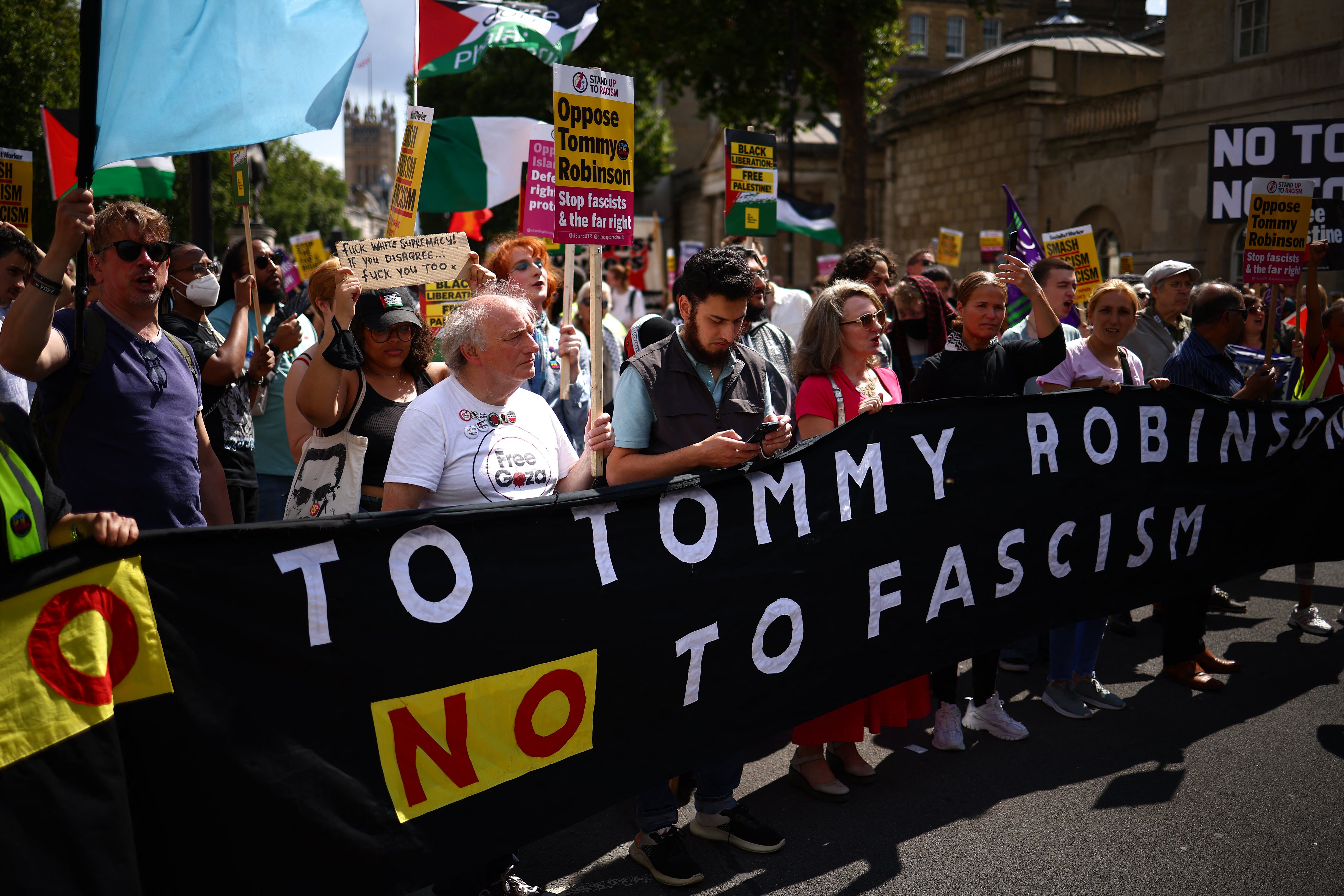 Participants of a counter demonstration against Tommy Robinson and his supporters