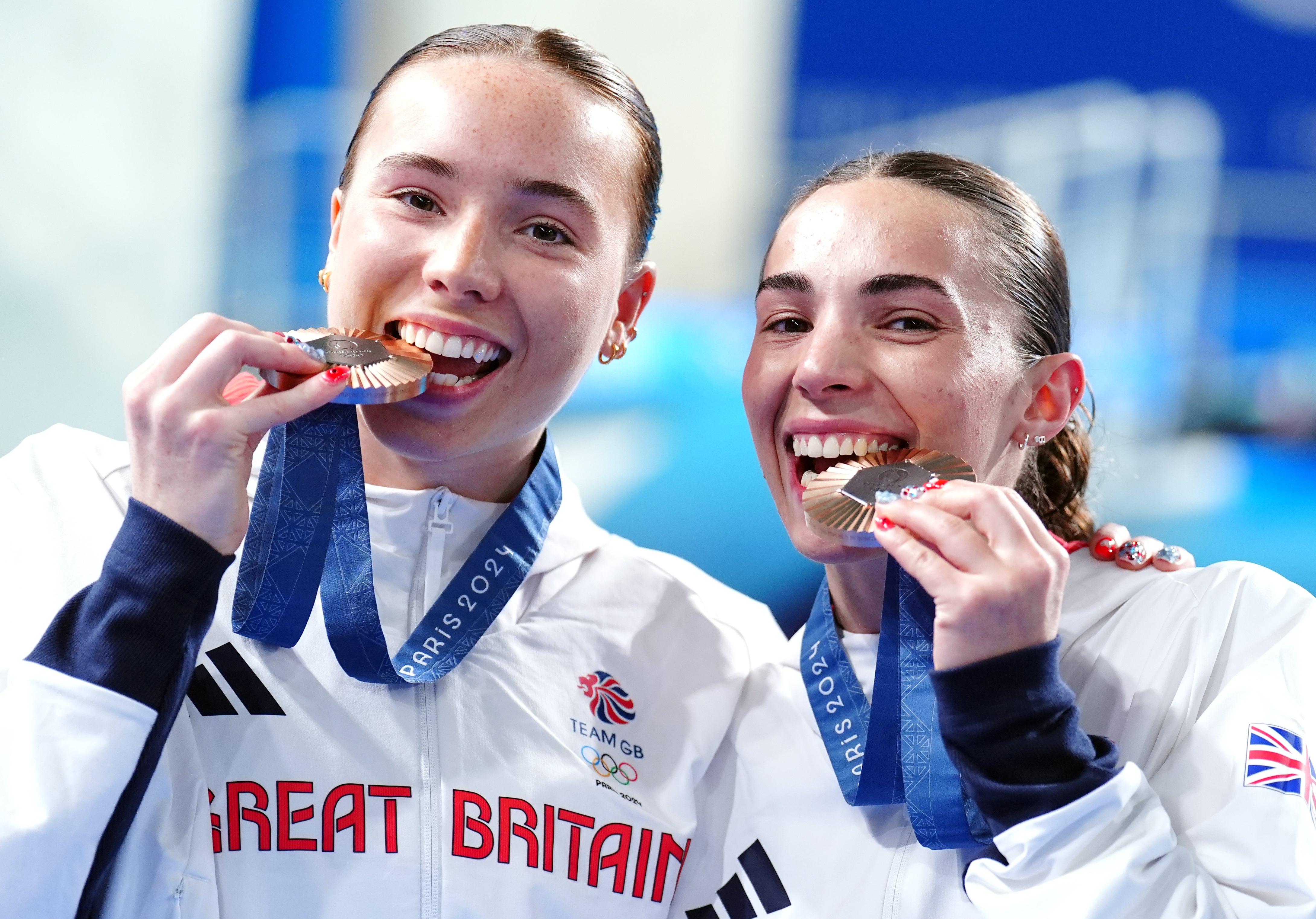 Great Britain’s Yasmin Harper and Scarlett Mew Jensen with their women’s 3m synchronised springboard diving bronze medals (Mike Egerton/PA).