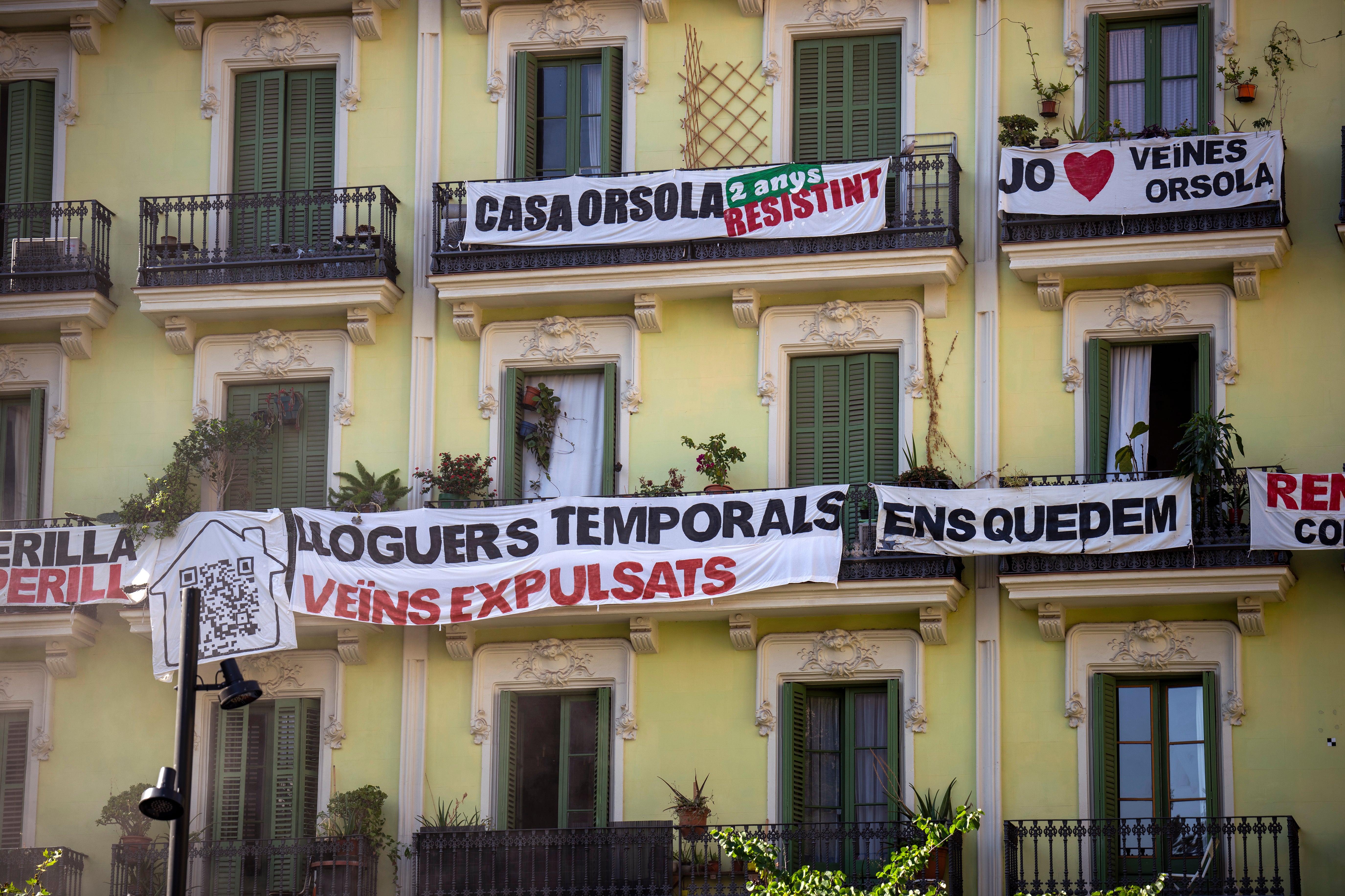 A block of flats, which is under threat of eviction, is photographed in downtown Barcelona, Spain, Wednesday