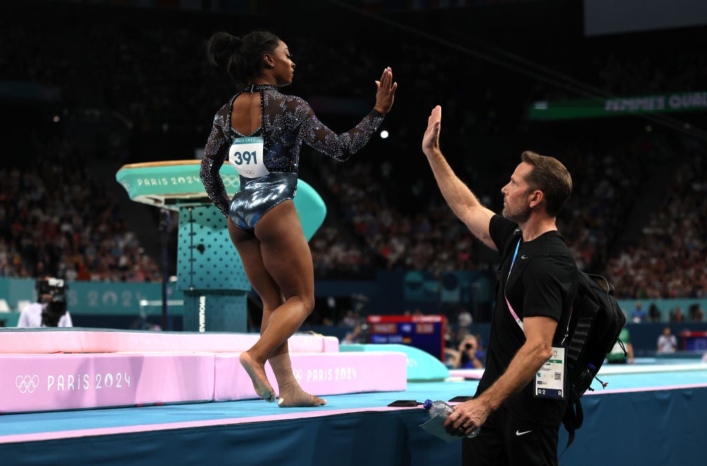 Biles wears strapping on her left ankle