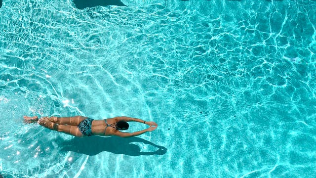 <p>Swimming pool owners should be forced to pay more for water, an industry body suggests</p>